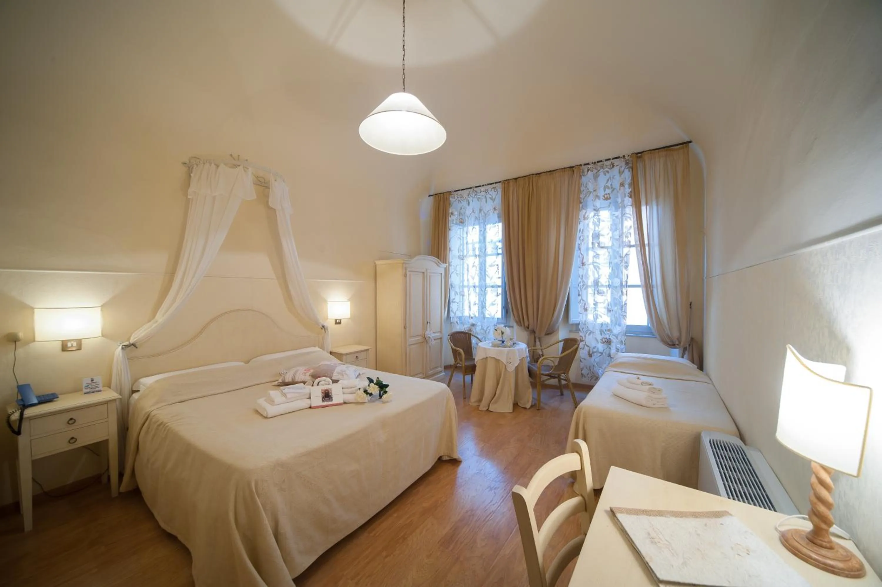 Bed in Albergo Etruria