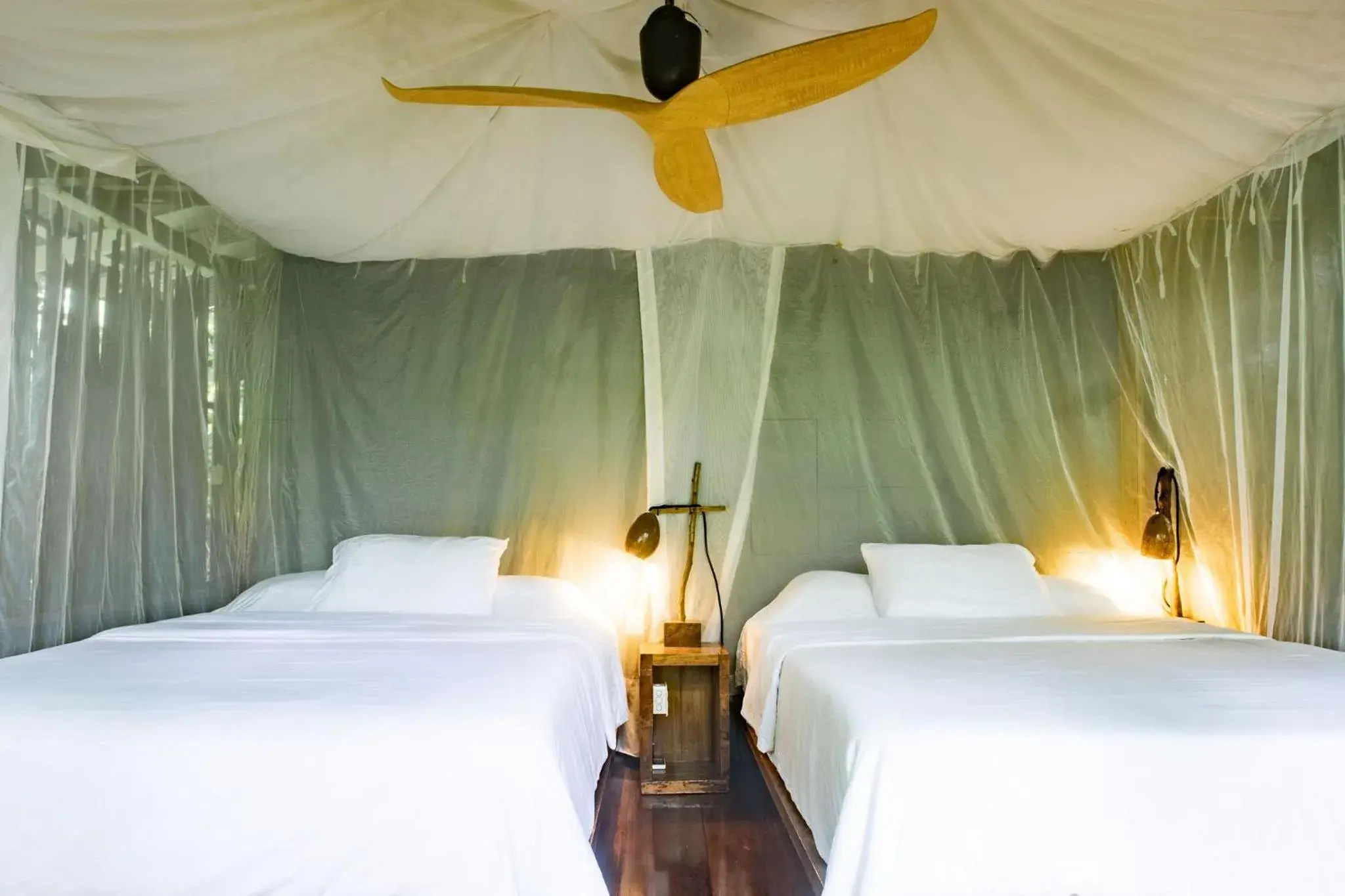 Bed in La Loma Jungle Lodge and Chocolate Farm Bed in La Loma Jungle Lodge and Chocolate Farm