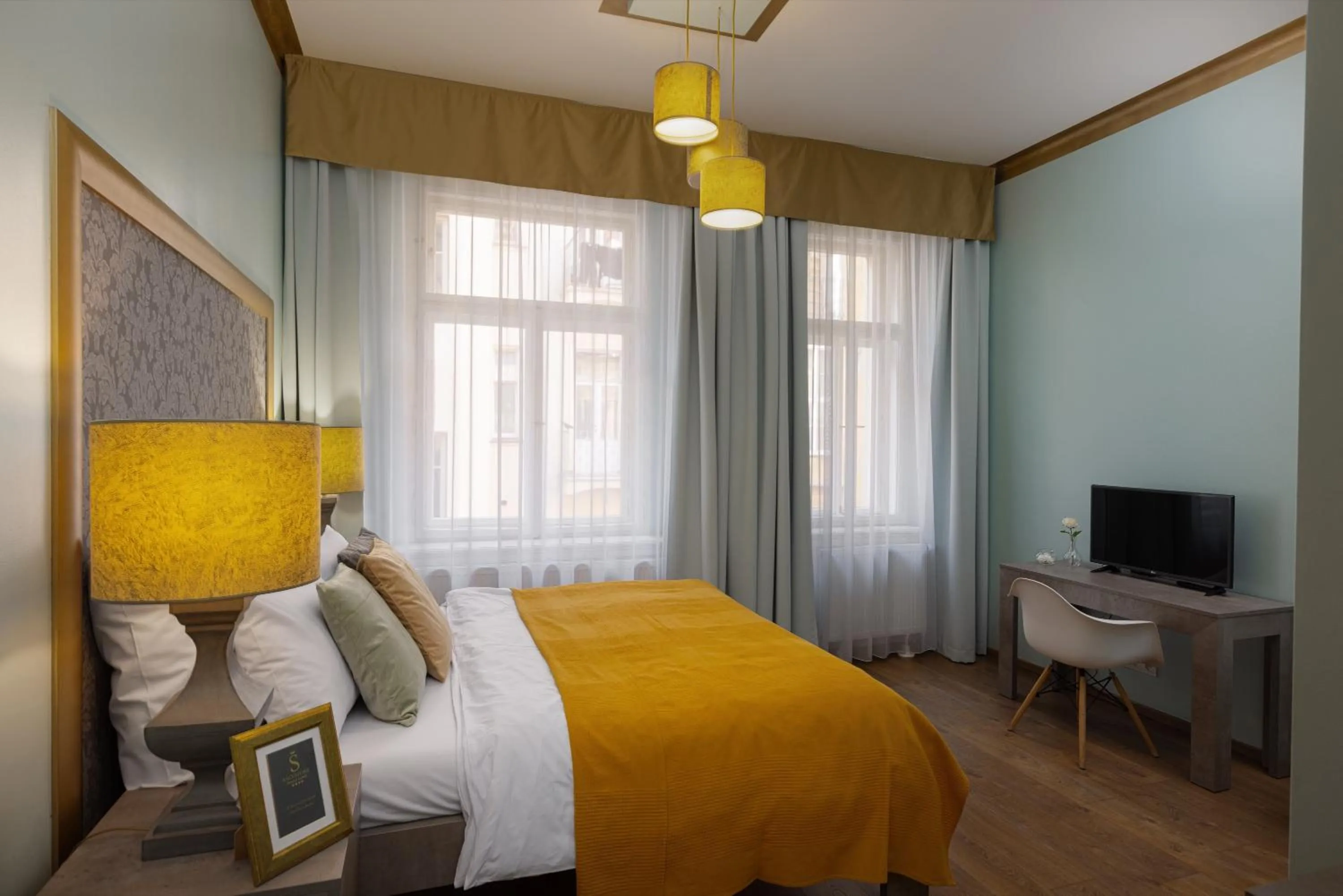 Bed in Salvatore Prague Rooms