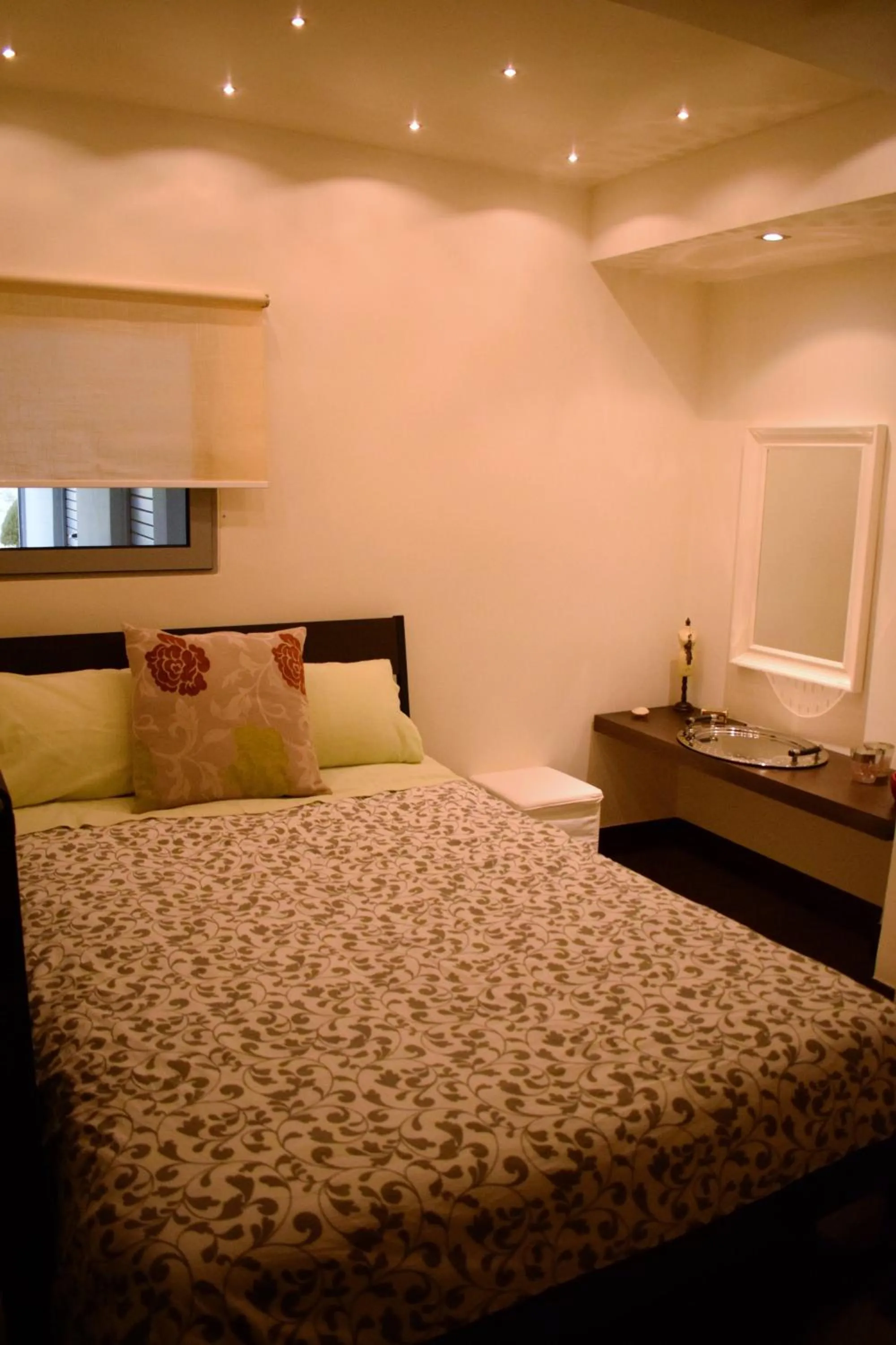 Bed in Panorama Penthouse & Studios