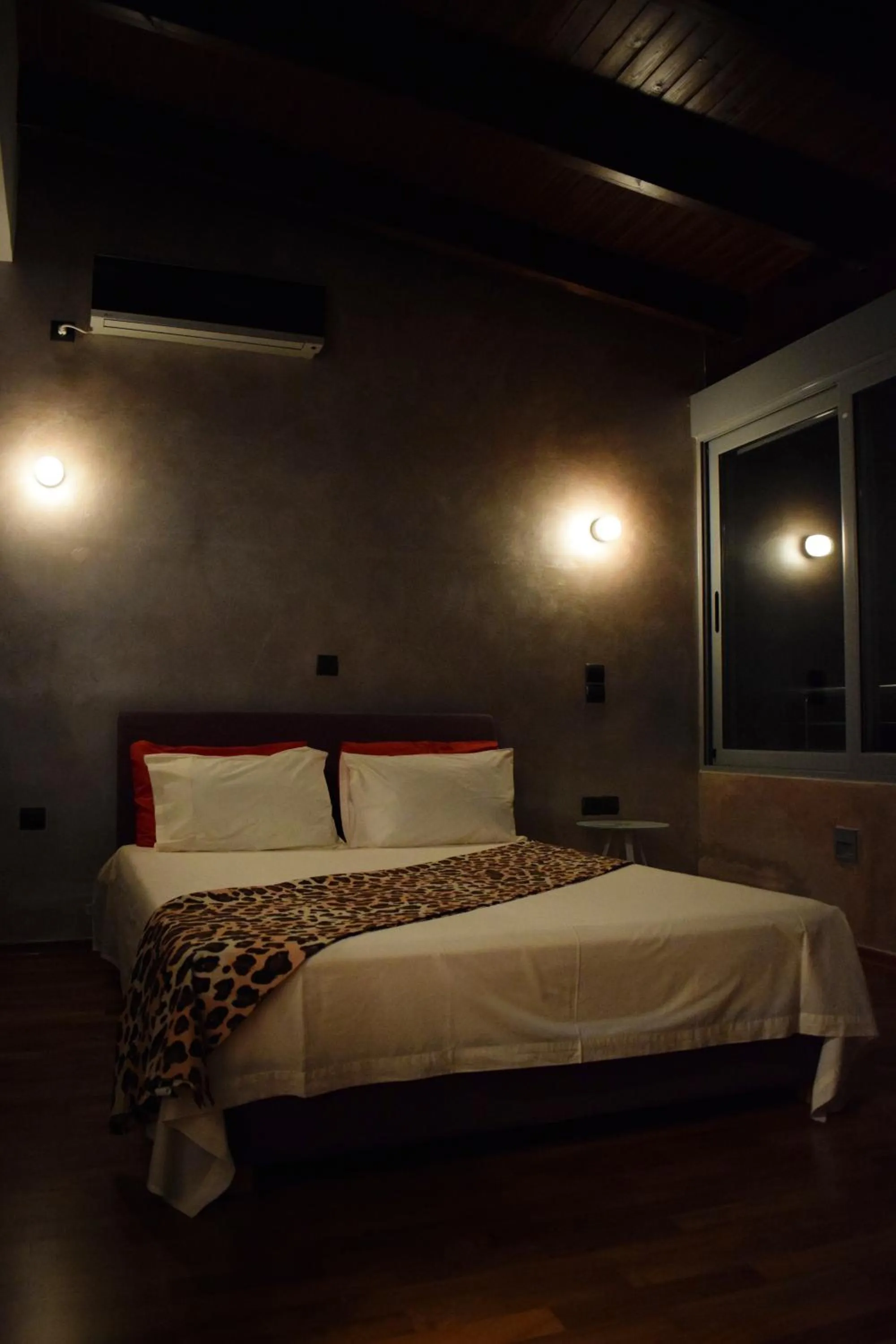 Bed in Panorama Penthouse & Studios