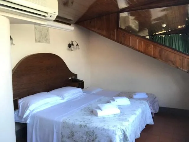 Bed in Hotel OKAPI