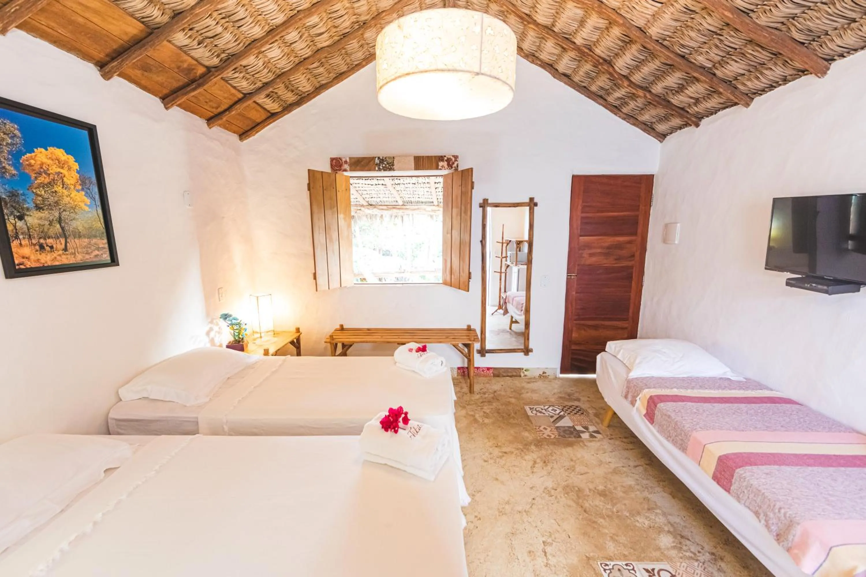 Bed in Pousada Titas