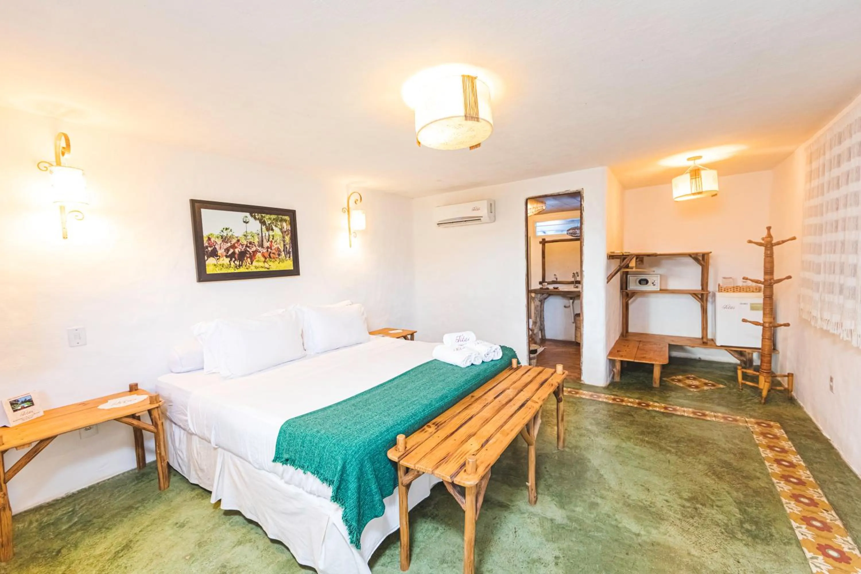 Bed in Pousada Titas