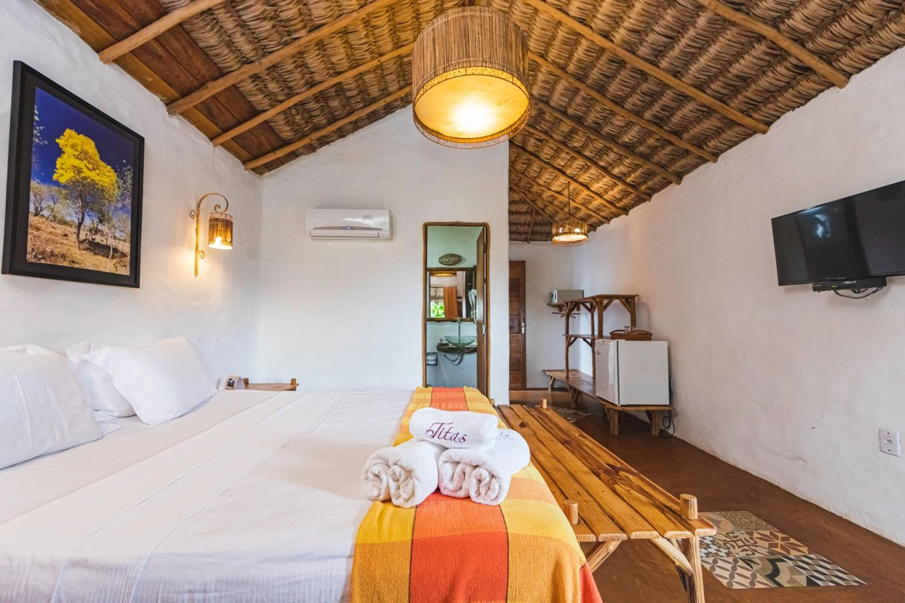 Bed in Pousada Titas