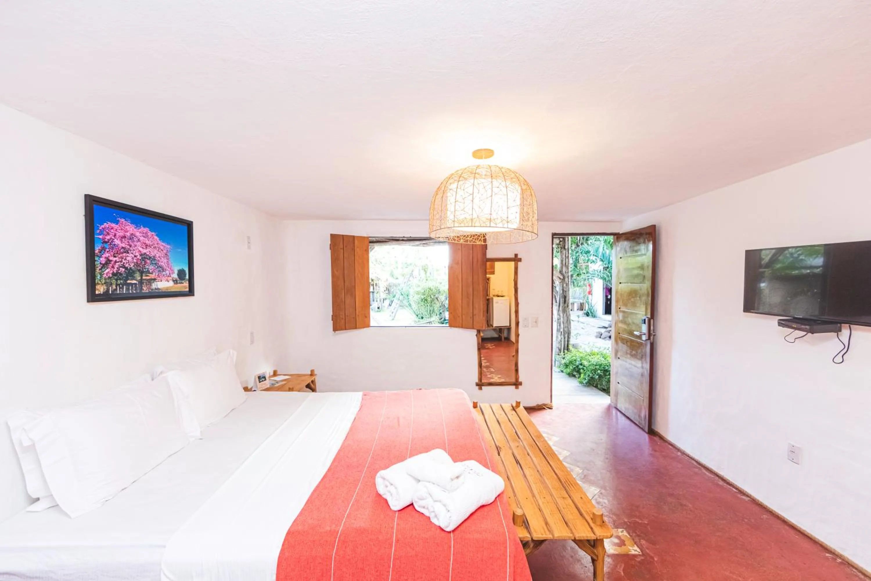 Bed in Pousada Titas