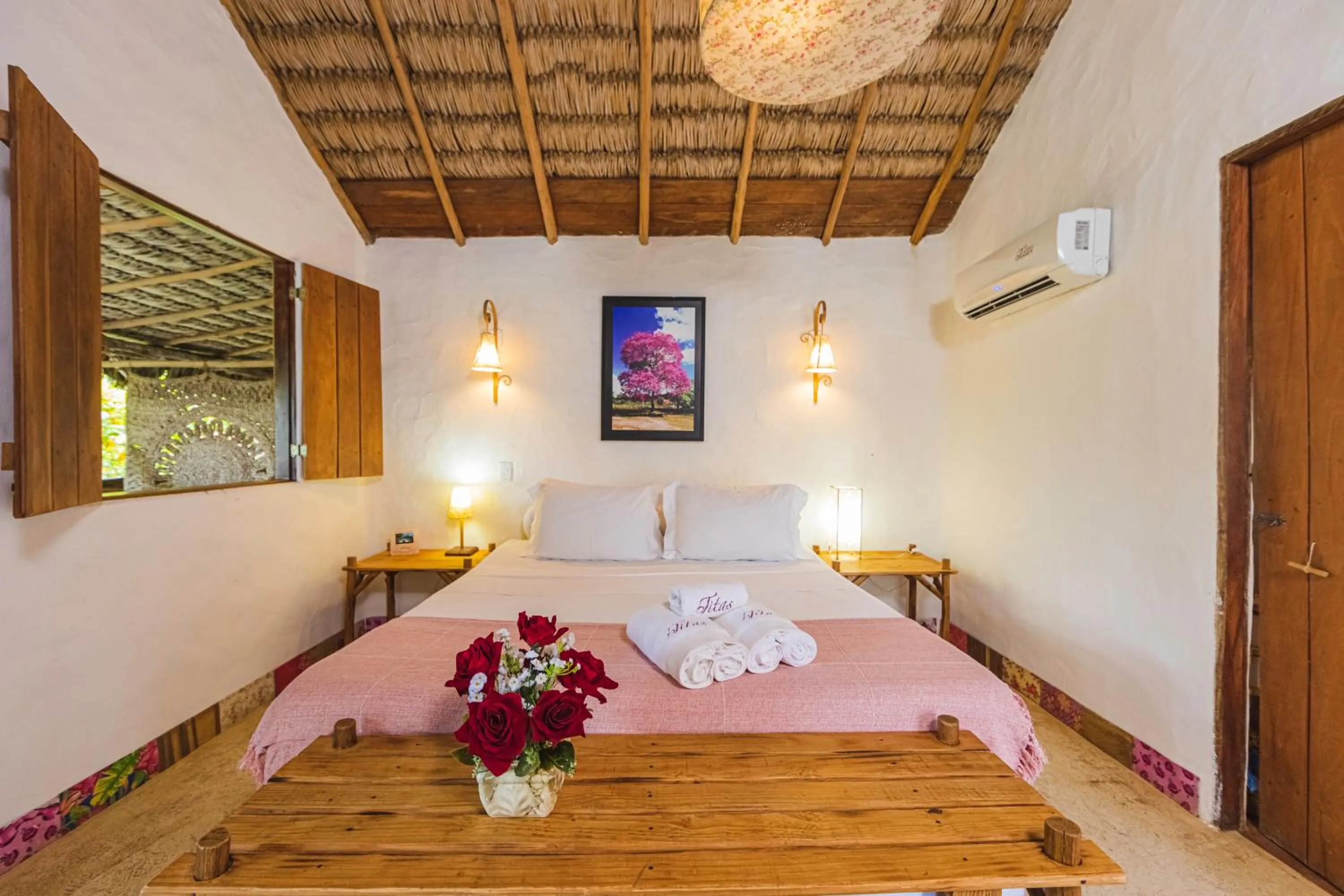 Bed in Pousada Titas