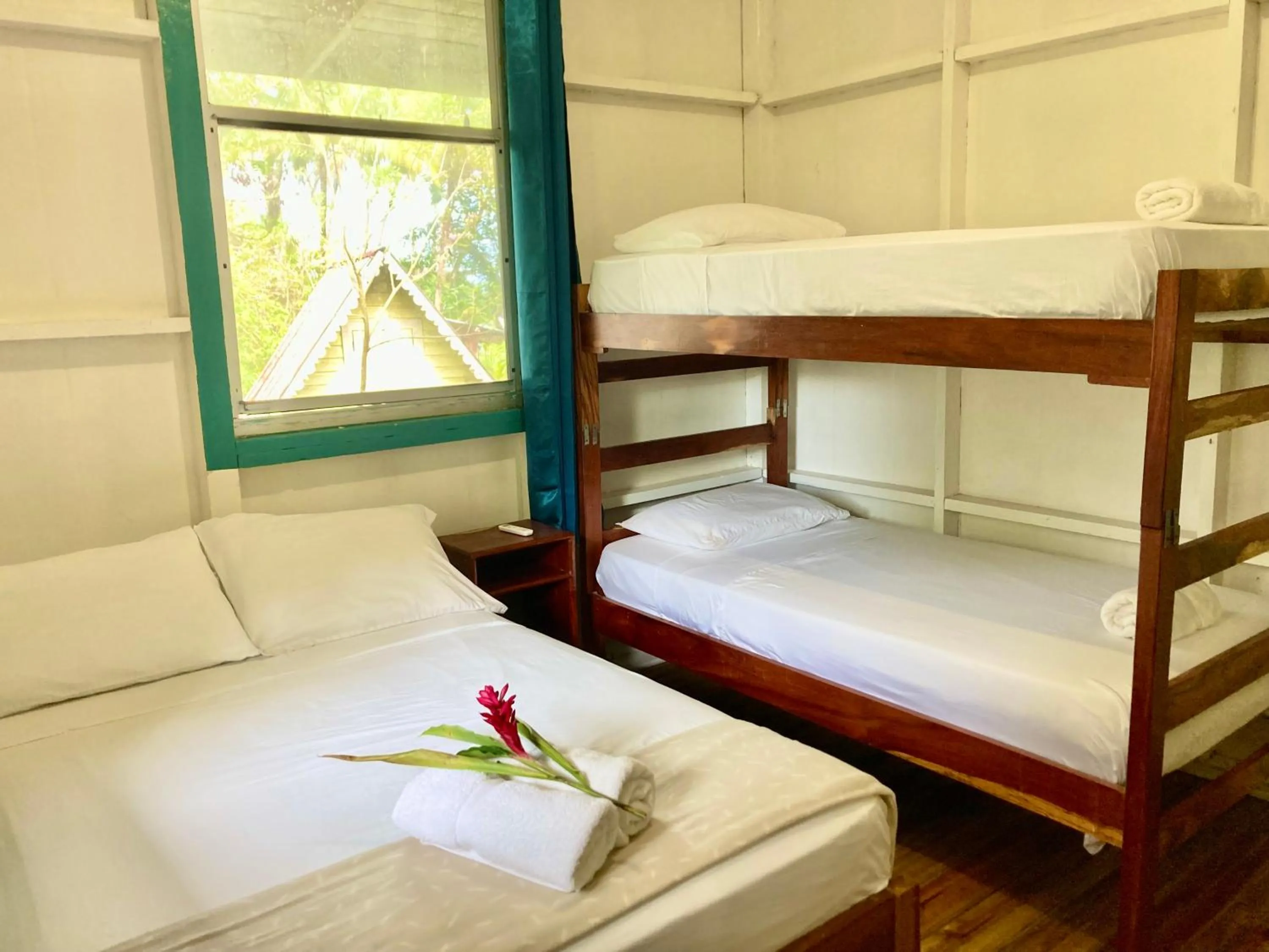 Bedroom, Bed in Drago Beach House - Private Beach