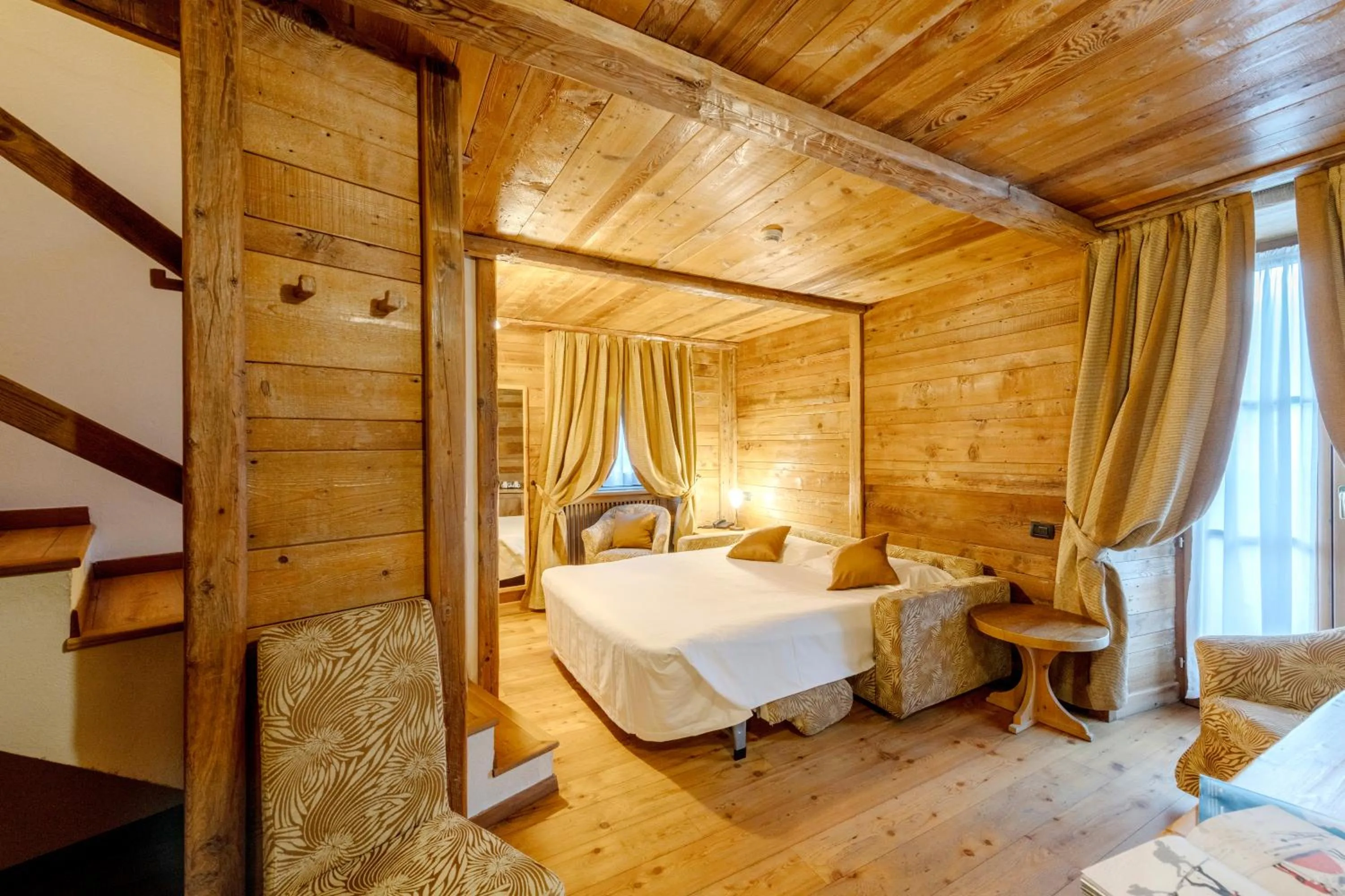 Bed in Le Miramonti Hotel Restaurant & Wellness