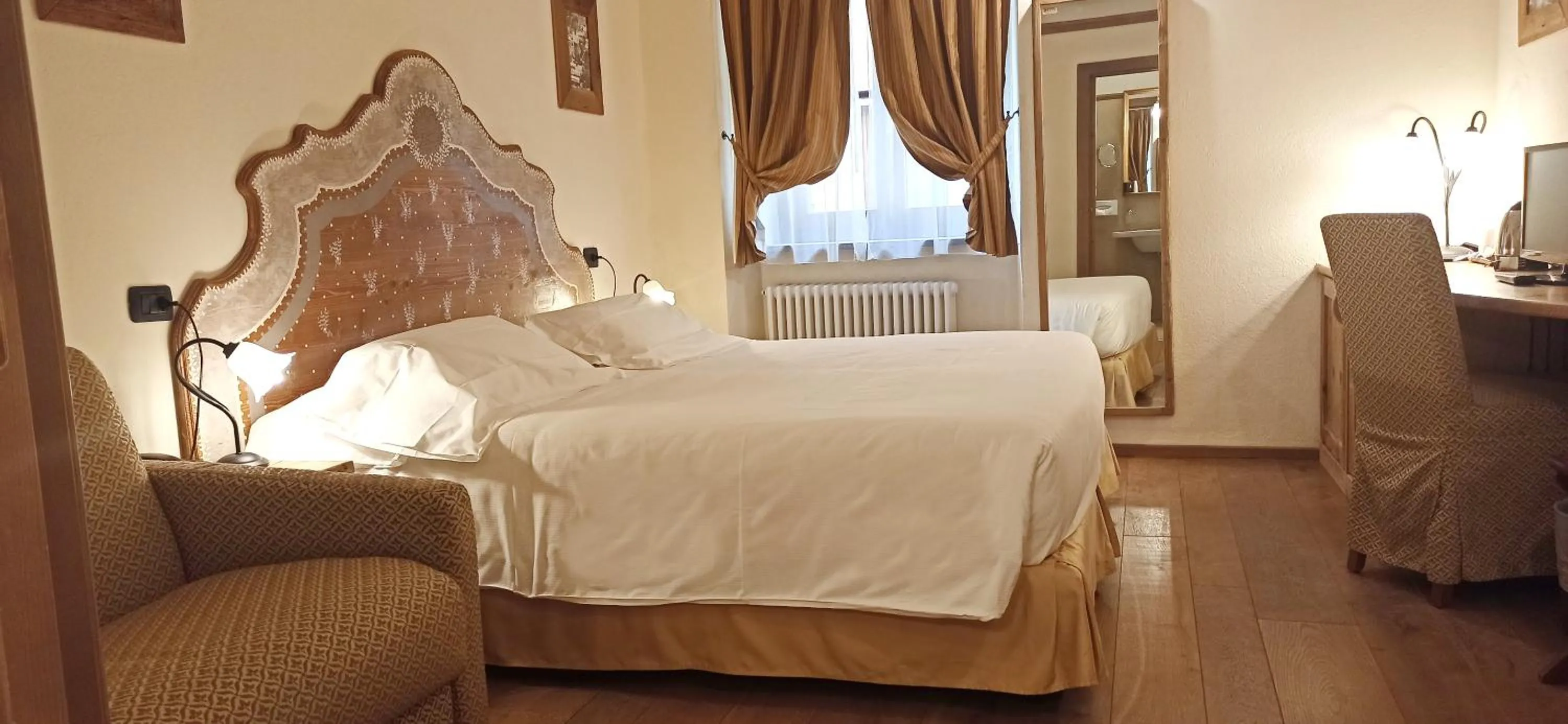 Bed in Le Miramonti Hotel Restaurant & Wellness