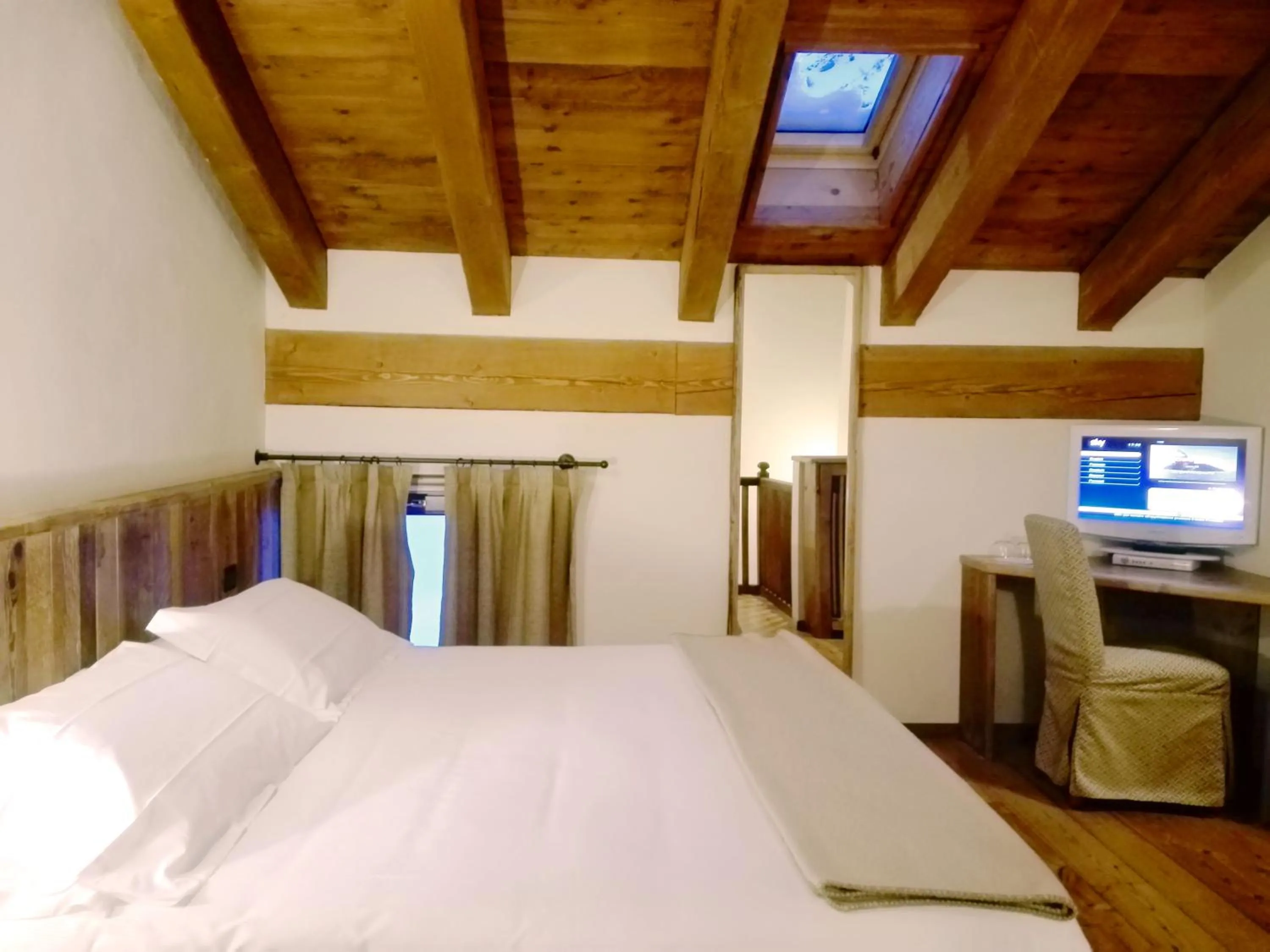 Bed in Le Miramonti Hotel Restaurant & Wellness