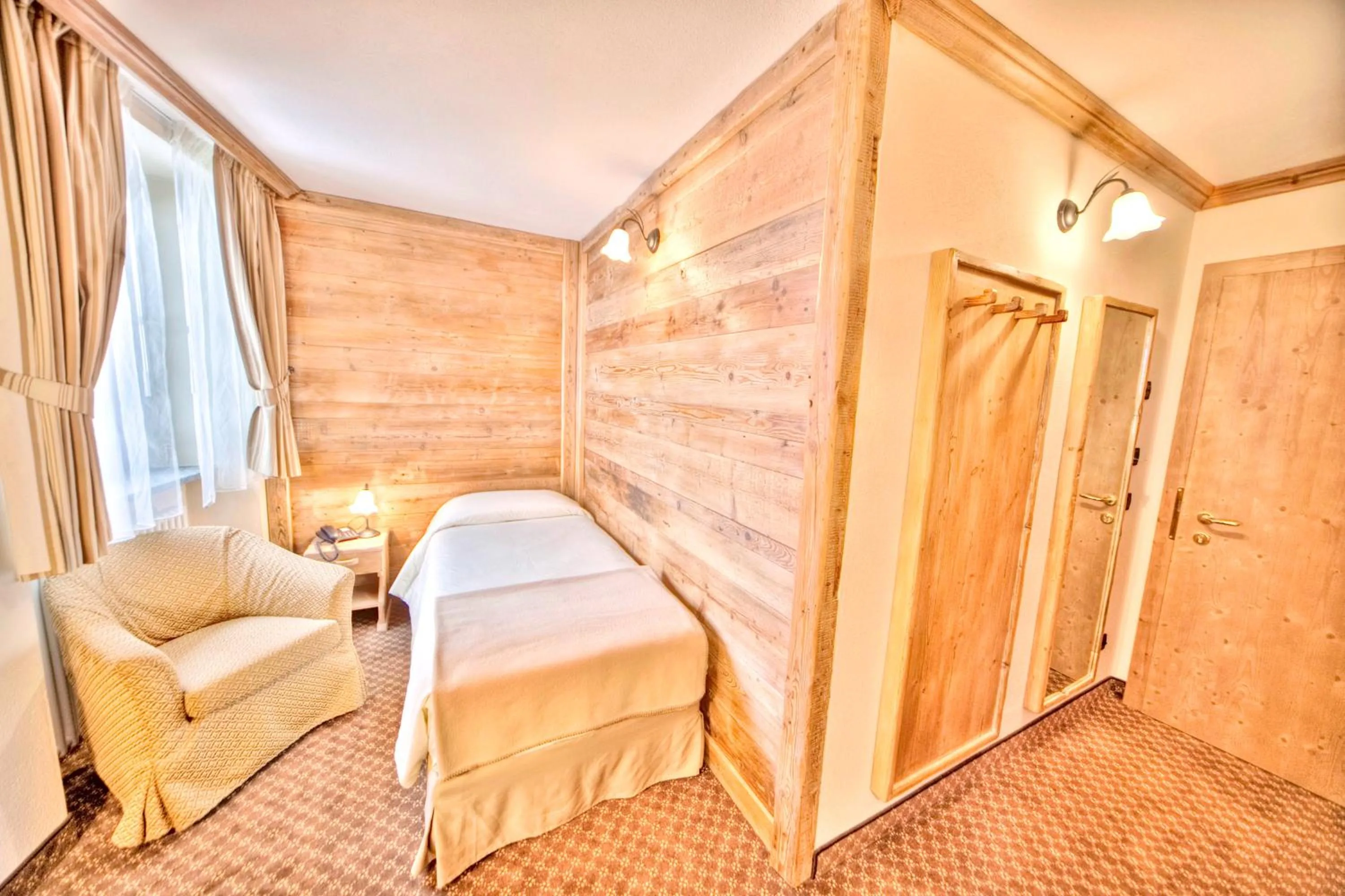 Bed in Le Miramonti Hotel Restaurant & Wellness