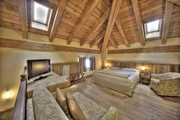 Bed in Le Miramonti Hotel Restaurant & Wellness