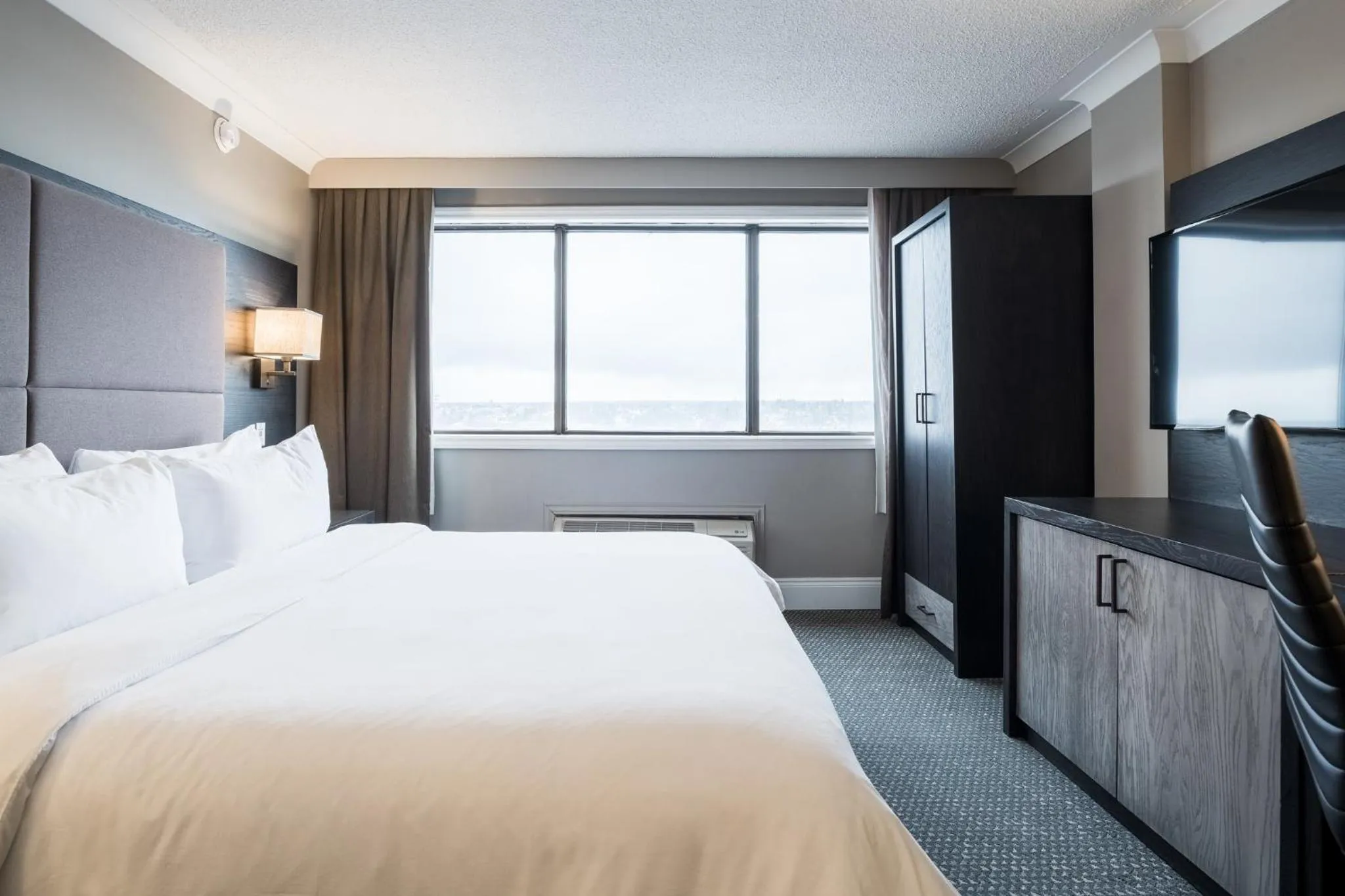 Photo of the whole room, Bed in Crowne Plaza Hotel Moncton Downtown by IHG