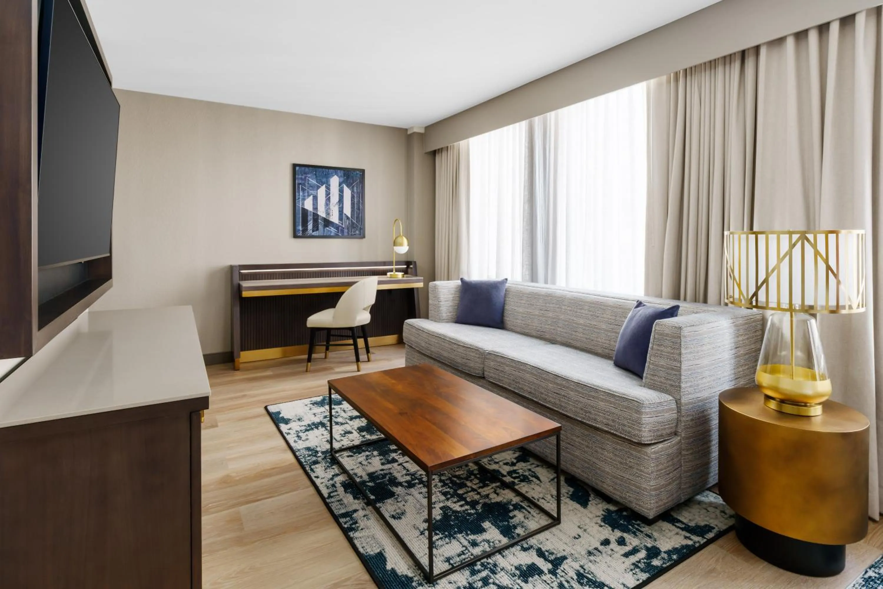 Communal lounge/ TV room in DoubleTree by Hilton Charlotte City Center