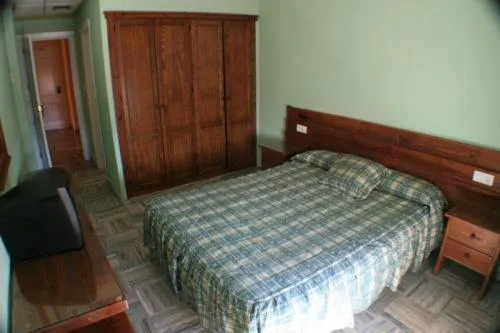 Photo of the whole room, Bed in Escudo de Granada