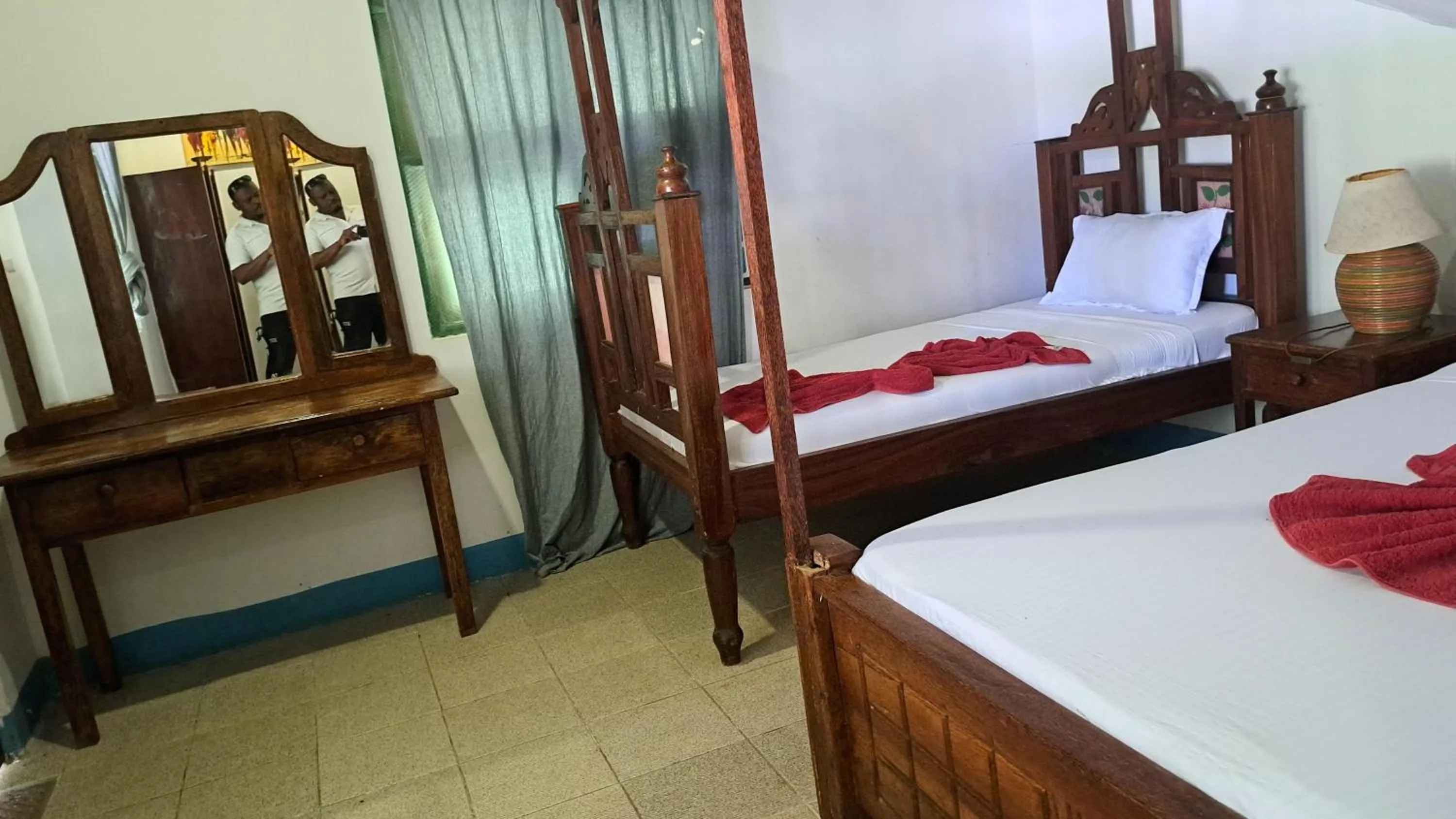 Bed in Menai Bay Beach Bungalows