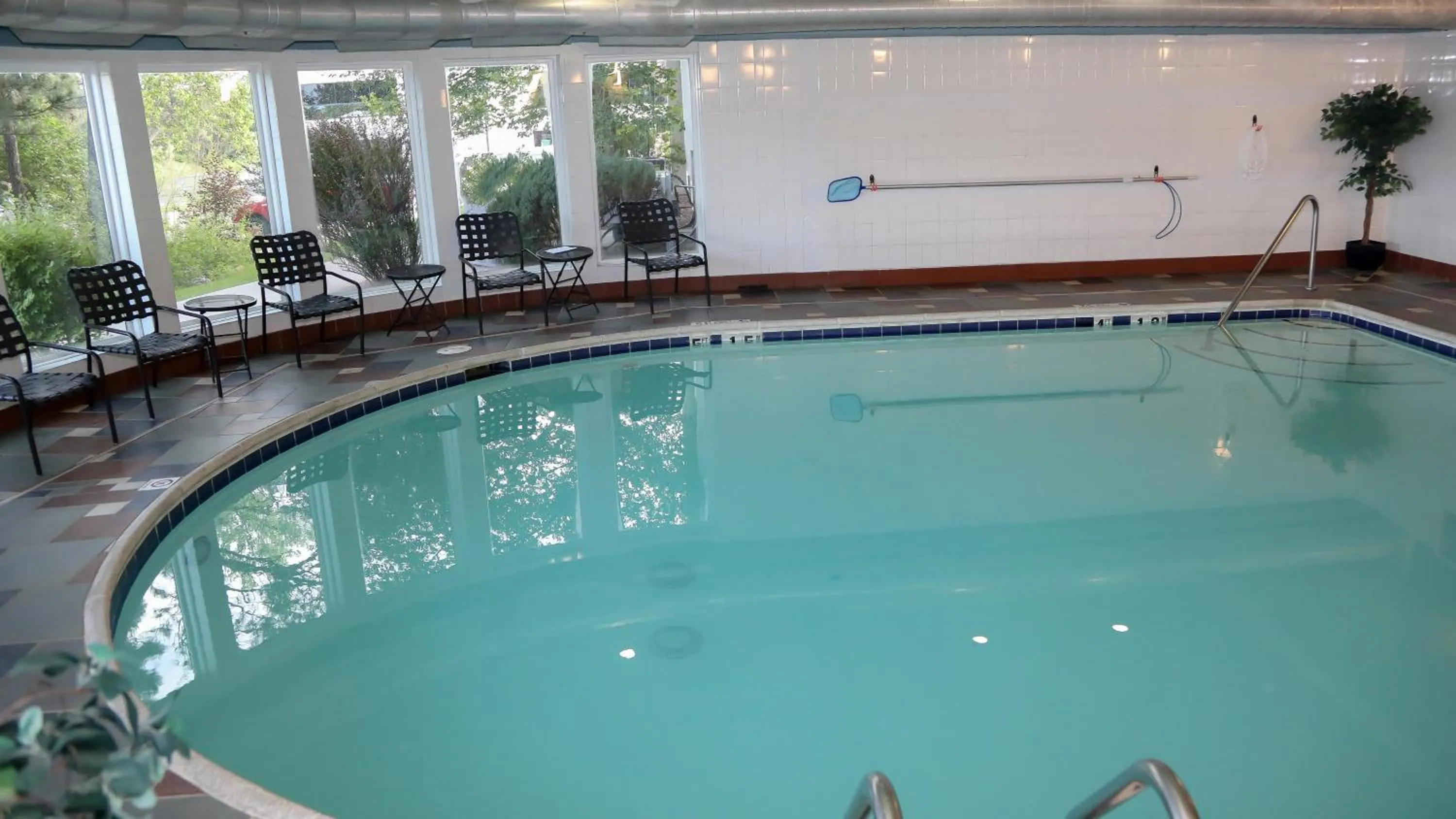 Swimming pool in Holiday Inn Express & Suites Colorado Springs North by IHG