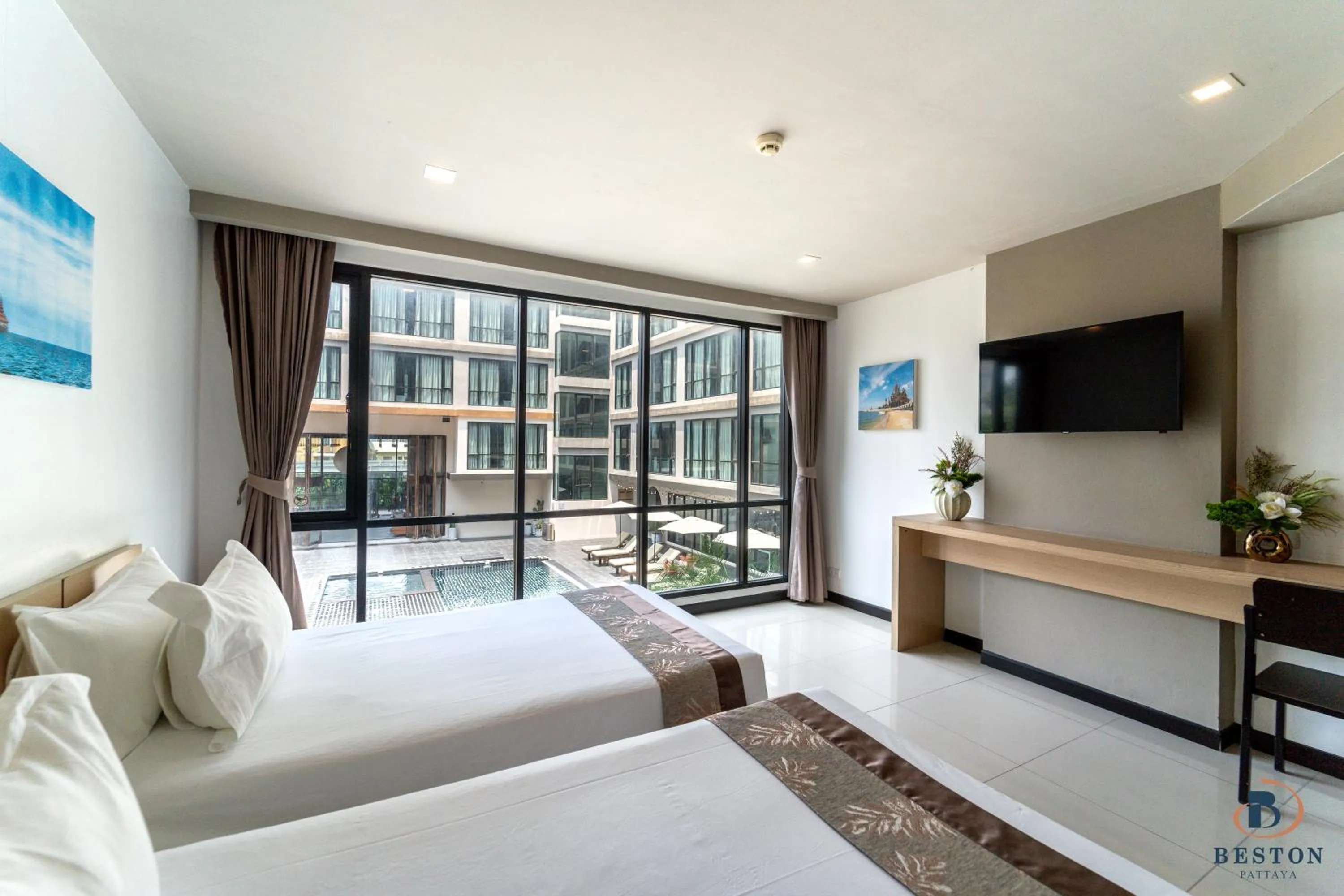 Pool view, Bed in Beston Pattaya - SHA Plus Certified