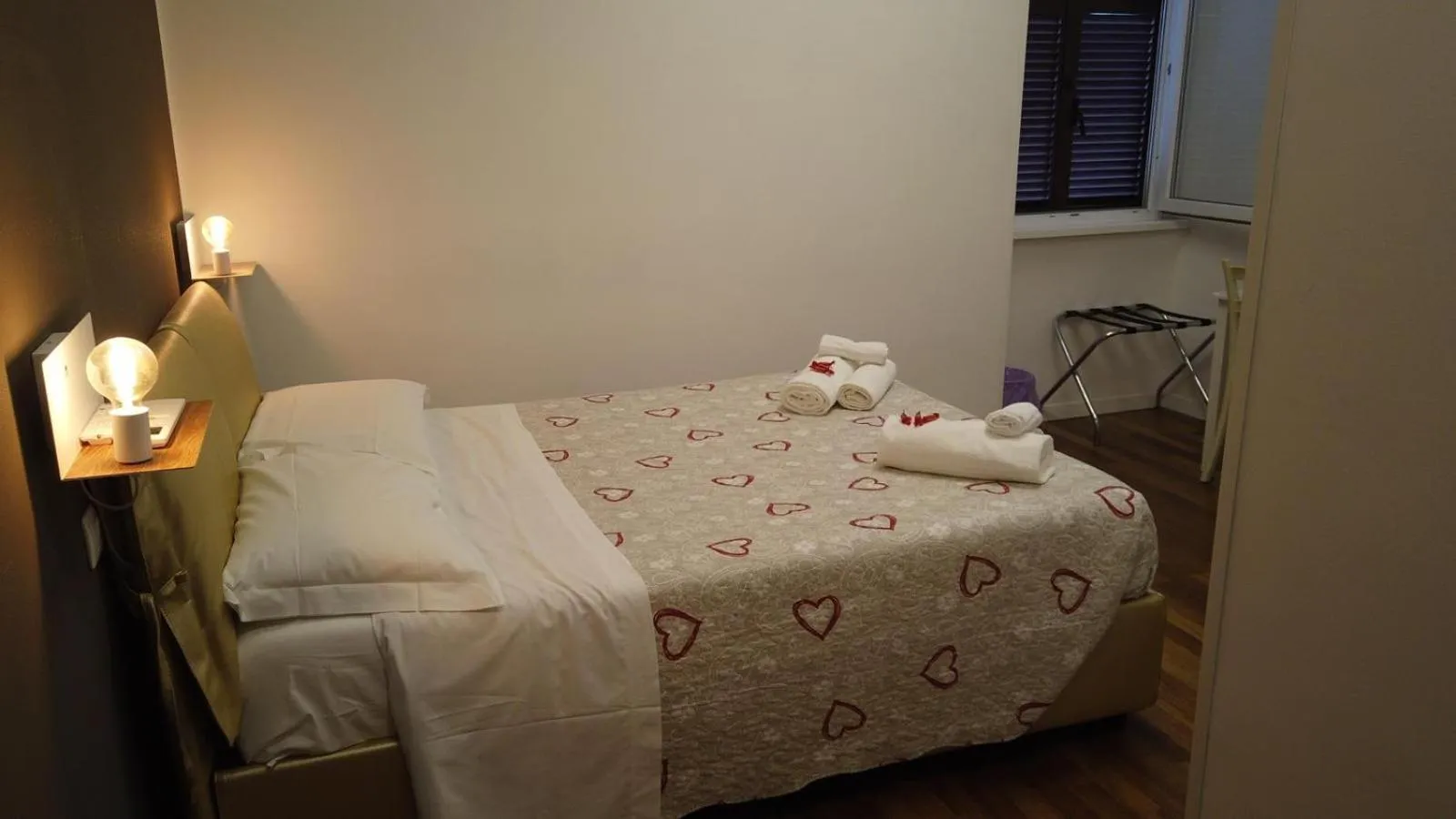 Bed in BB HomEitaly Civitavecchia