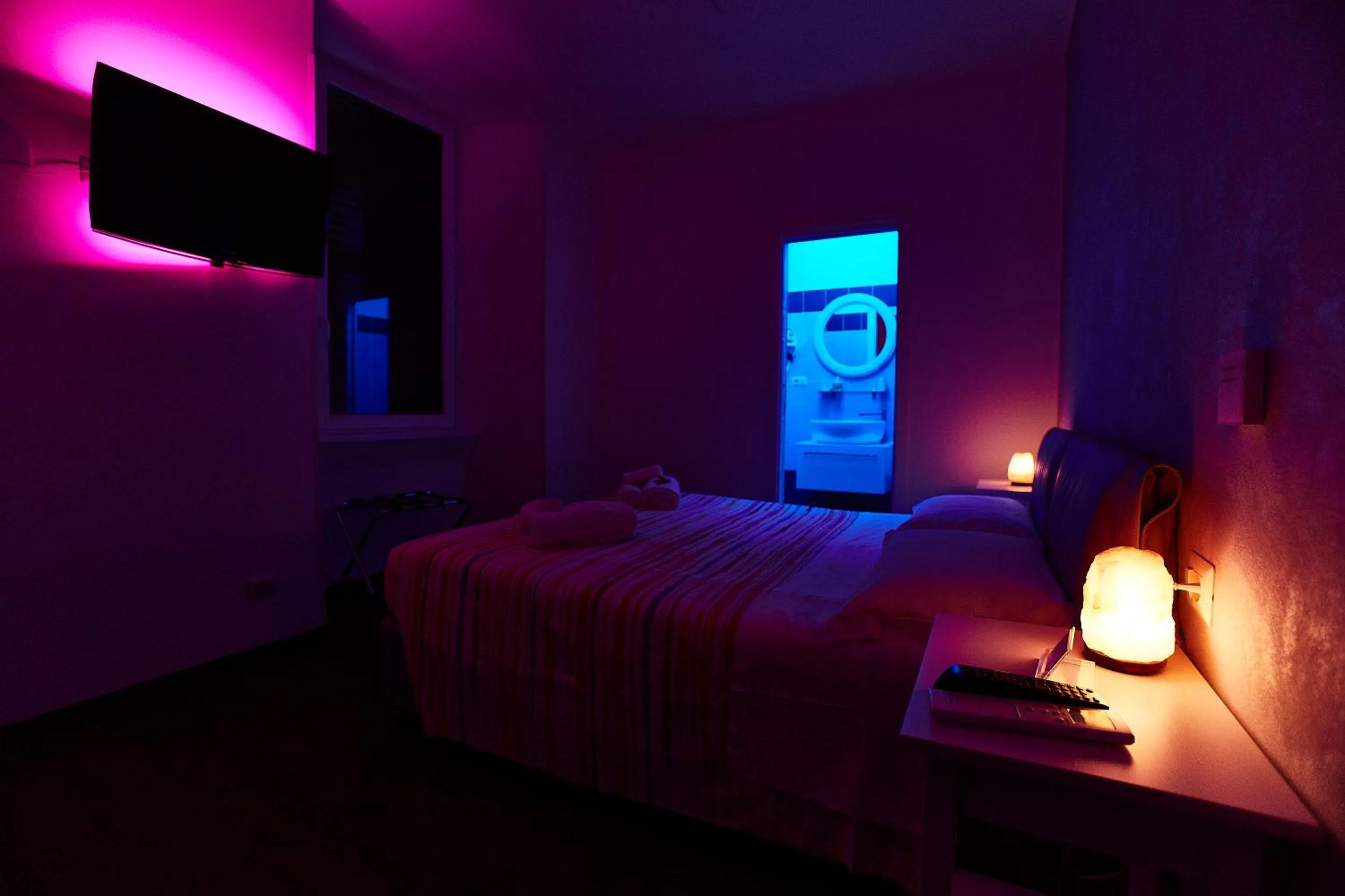 Bed in BB HomEitaly Civitavecchia