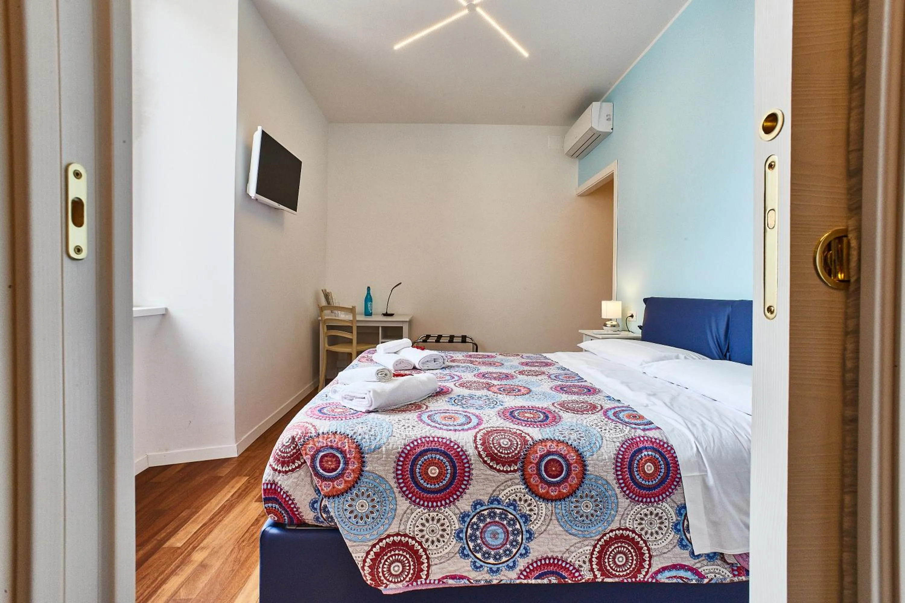 Bed in BB HomEitaly Civitavecchia