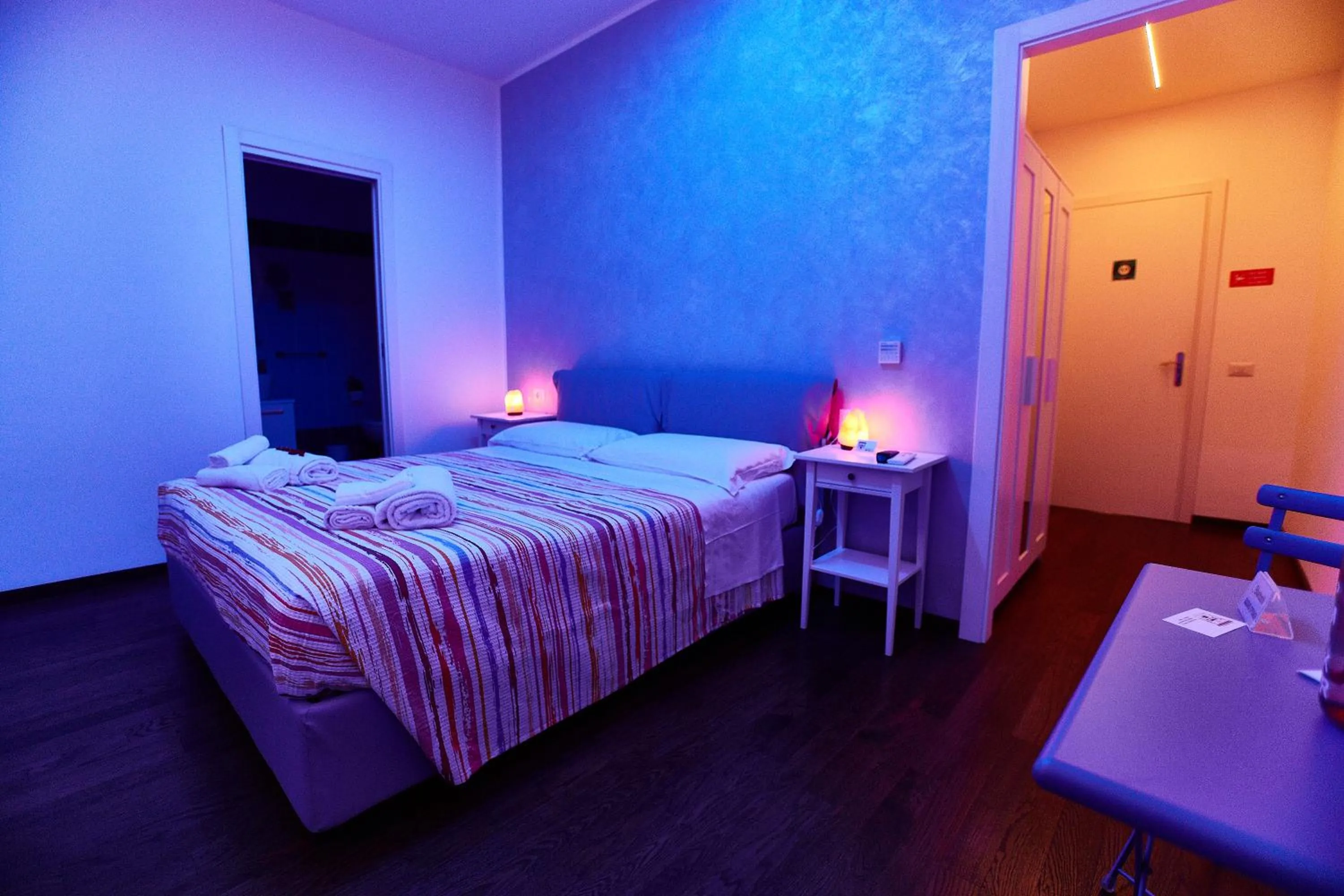 Bed in BB HomEitaly Civitavecchia