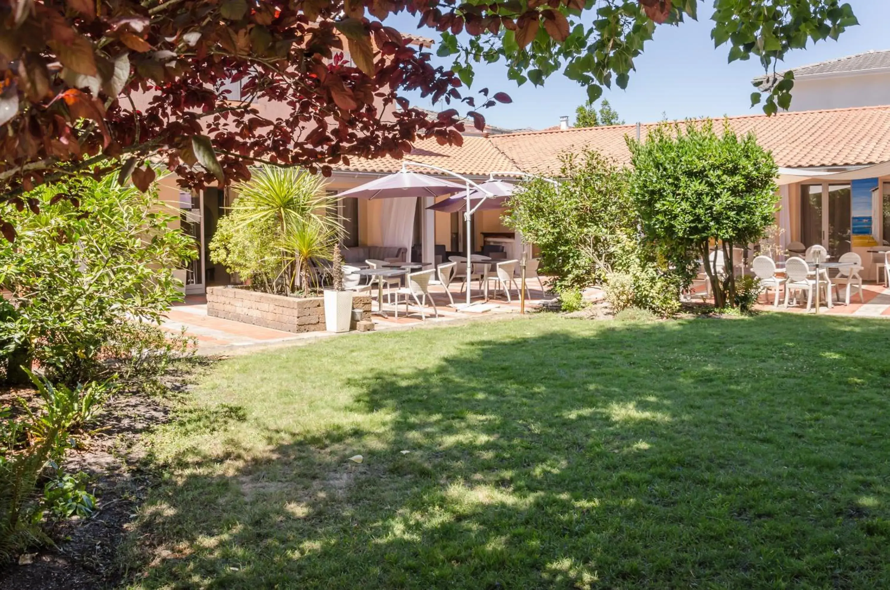 Property building in LOGIS HOTELS - Hôtel et Restaurant L'Océana Property building in LOGIS HOTELS - Hôtel et Restaurant L'Océana