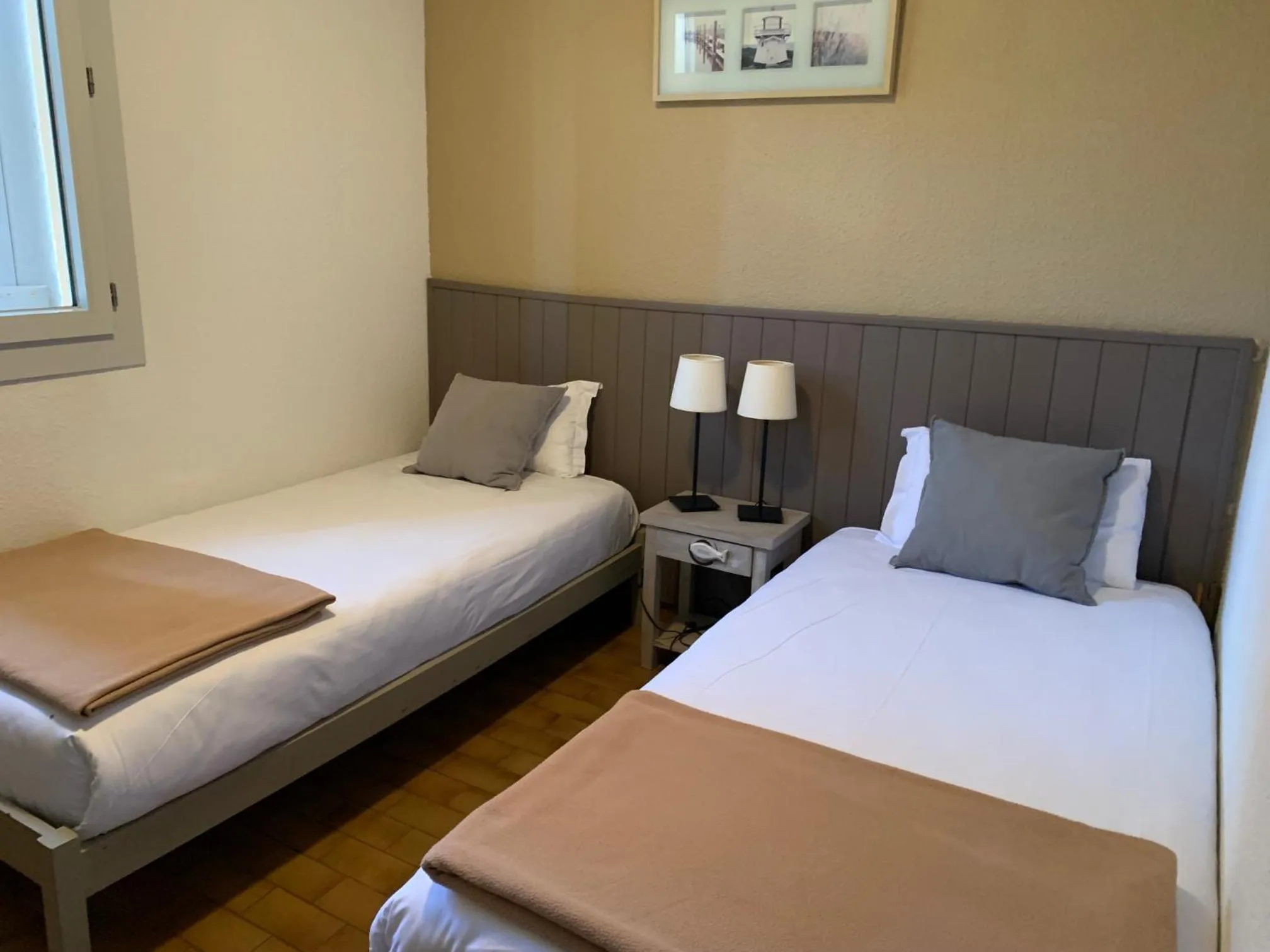 Photo of the whole room, Bed in LOGIS HOTELS - Hôtel et Restaurant L'Océana