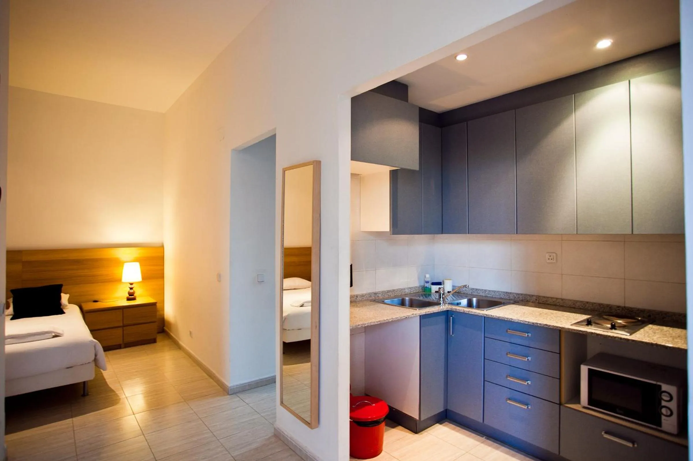 Bed in Ramblas Apartments