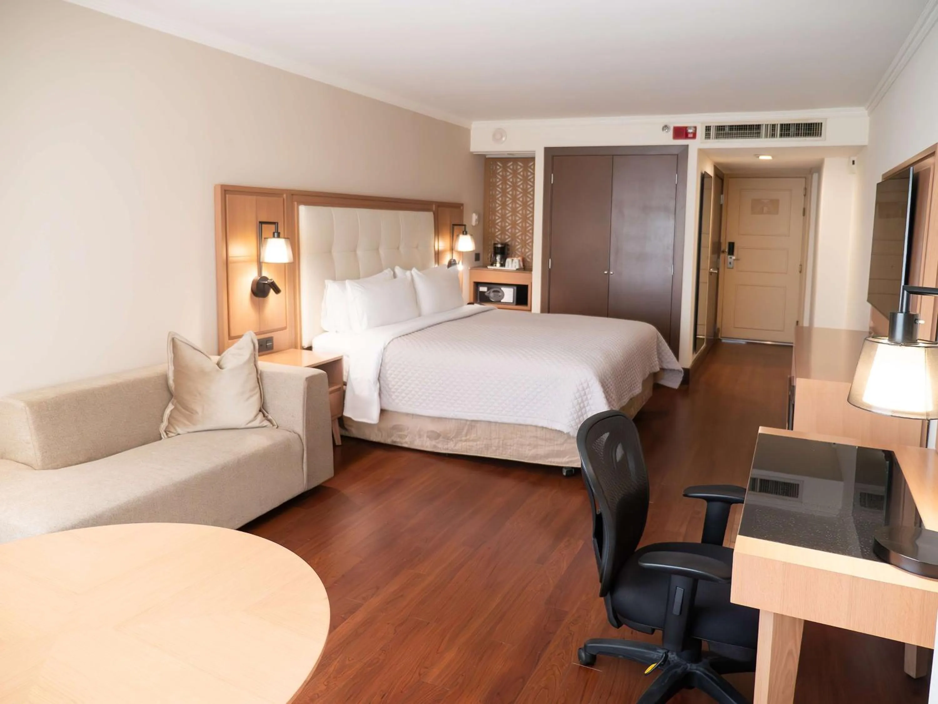 Living room, Bed in MS Milenium Monterrey Curio Collection by Hilton