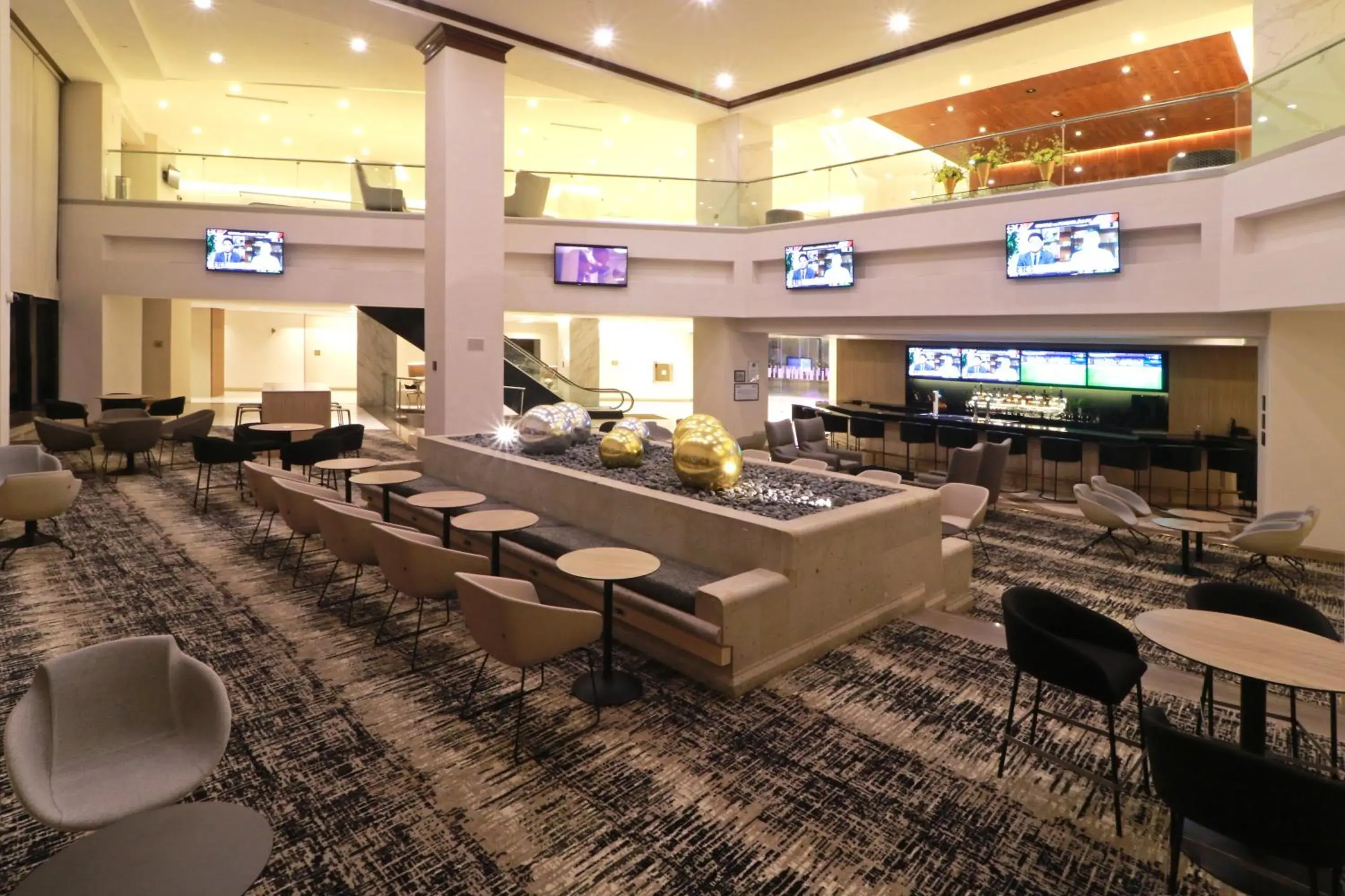 Lounge or bar in MS Milenium Monterrey Curio Collection by Hilton Lounge or bar in MS Milenium Monterrey Curio Collection by Hilton