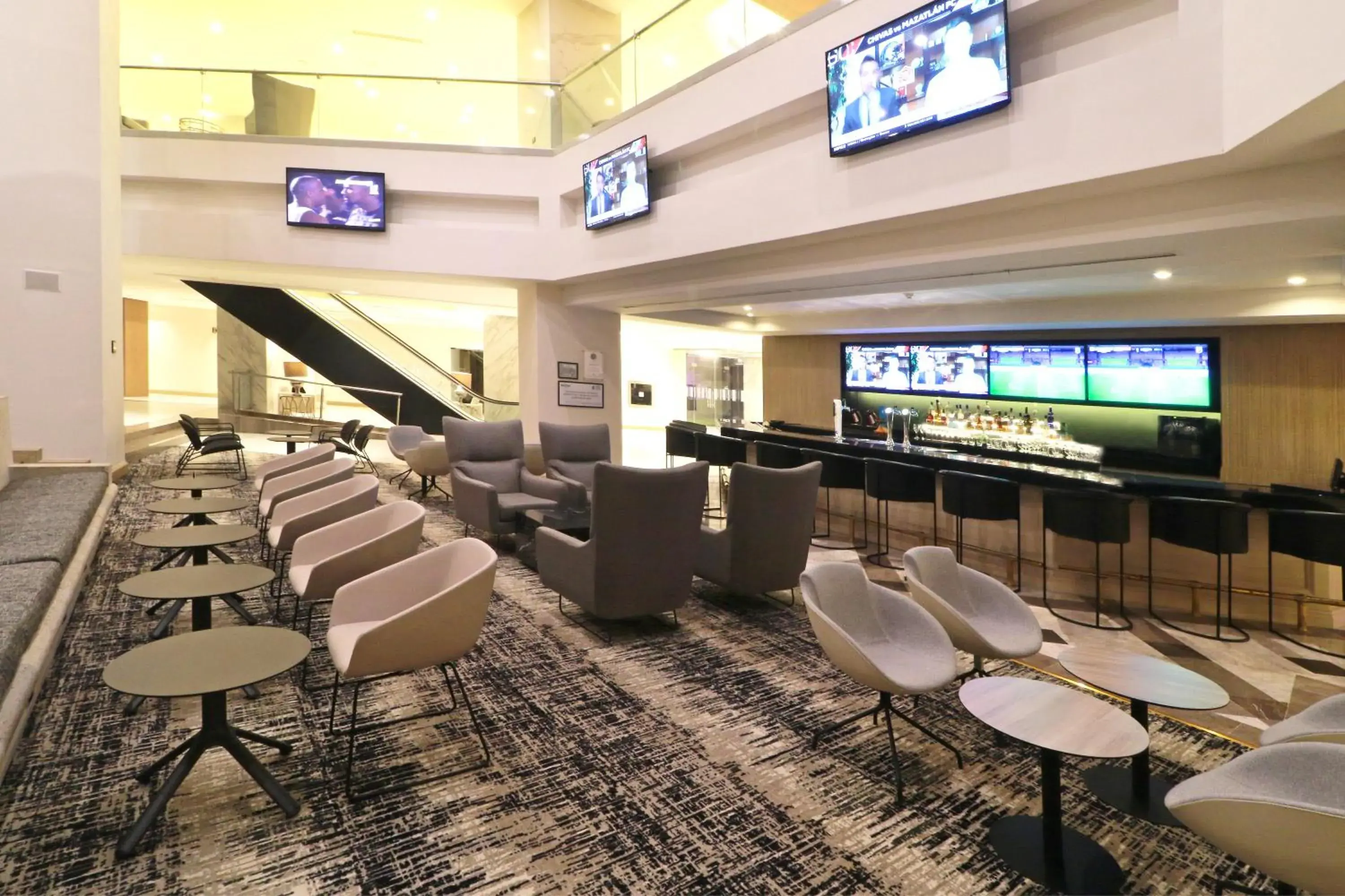 Lounge or bar in MS Milenium Monterrey Curio Collection by Hilton Lounge or bar in MS Milenium Monterrey Curio Collection by Hilton