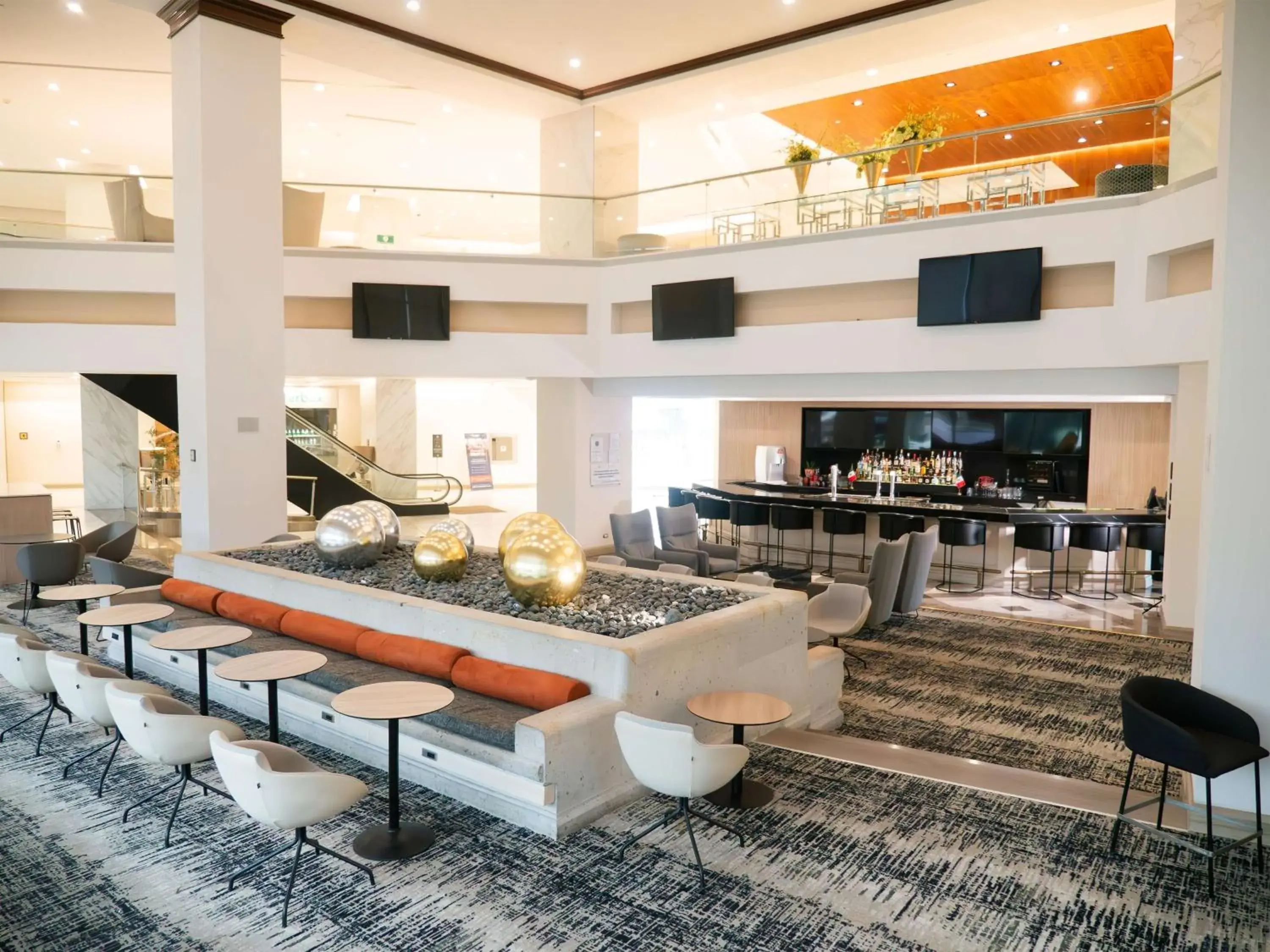 Lounge or bar in MS Milenium Monterrey Curio Collection by Hilton Lounge or bar in MS Milenium Monterrey Curio Collection by Hilton