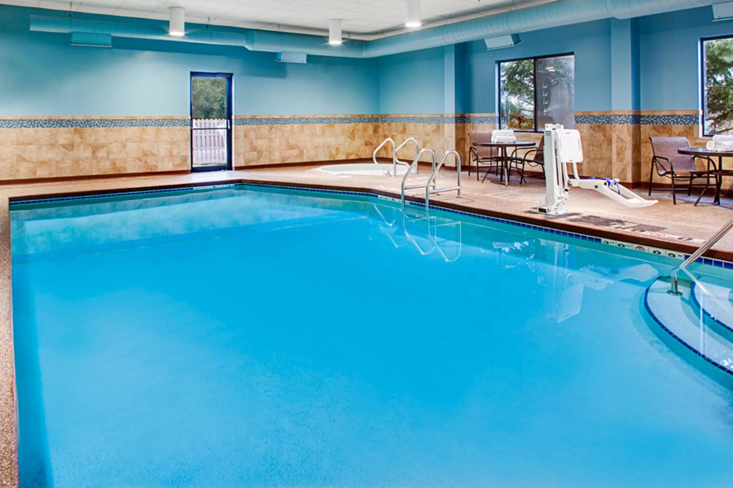Swimming pool in Holiday Inn Express Hotel & Suites Coralville by IHG