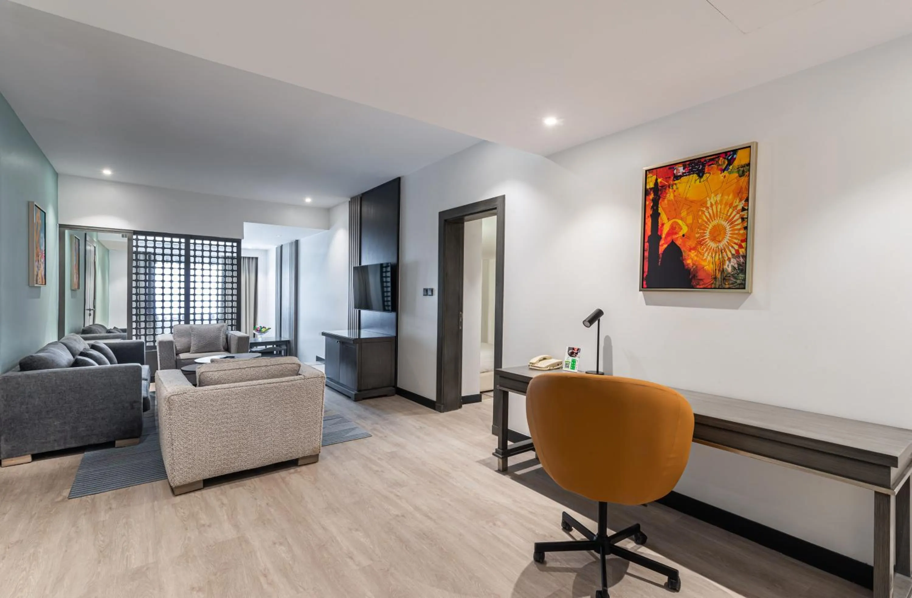 Communal lounge/ TV room in Holiday Inn Riyadh Al Qasr by IHG