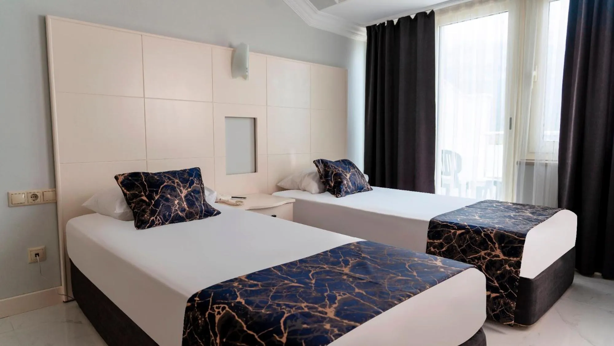 Bed in Rox Resort Hotel