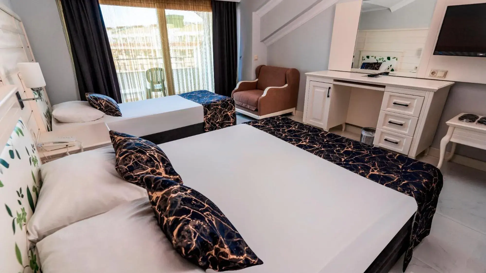 Bed in Rox Resort Hotel Bed in Rox Resort Hotel