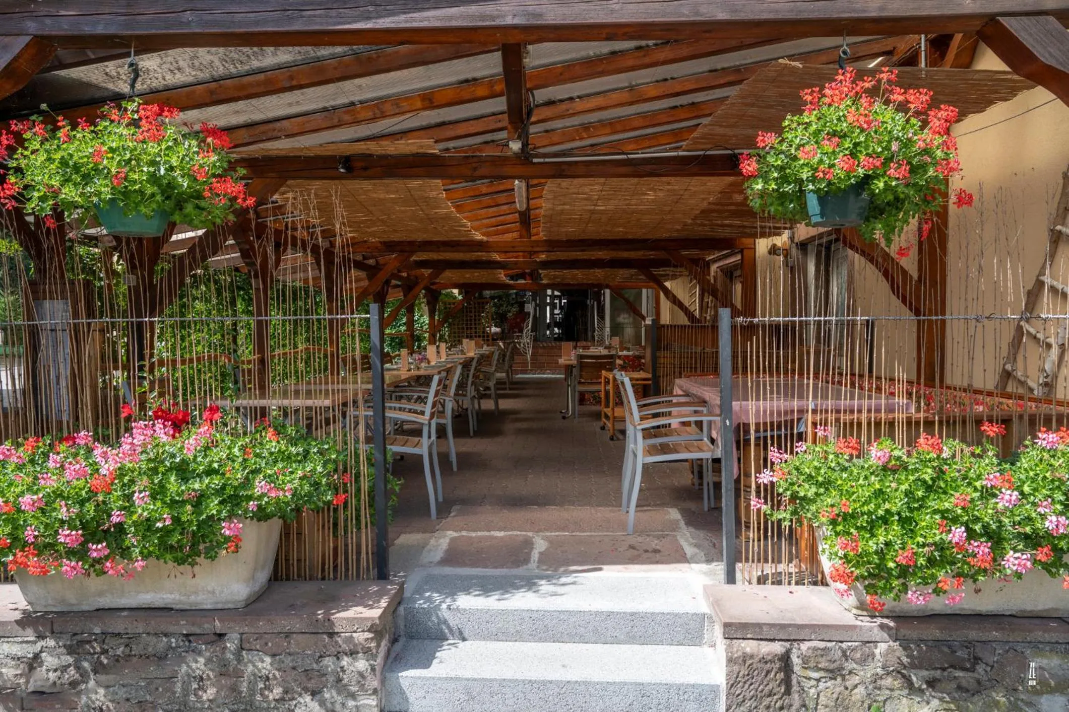 Patio in Logis Hotel Restaurant Le Faudé