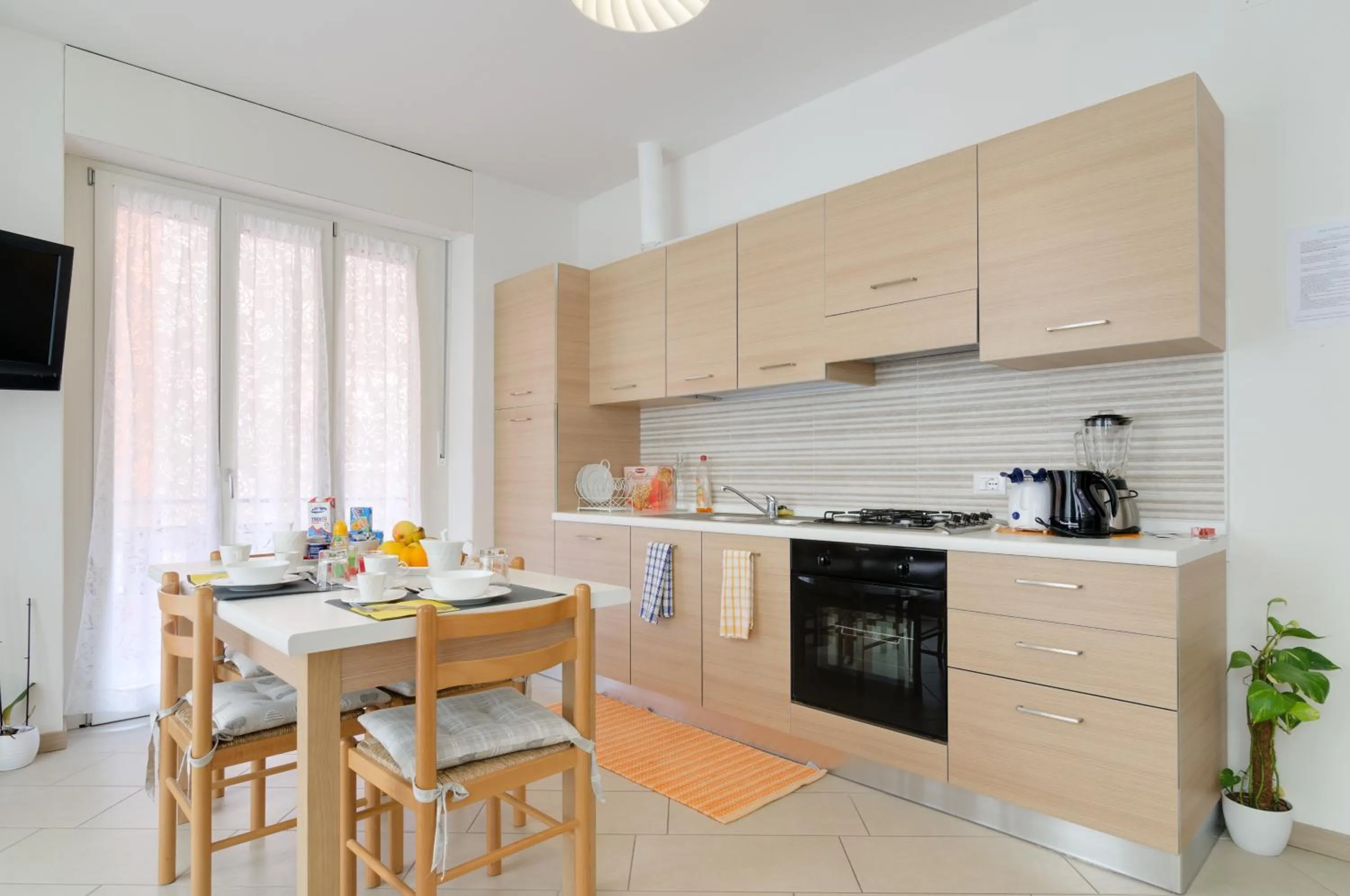 Communal kitchen in B&B and Apartments Armando Diaz