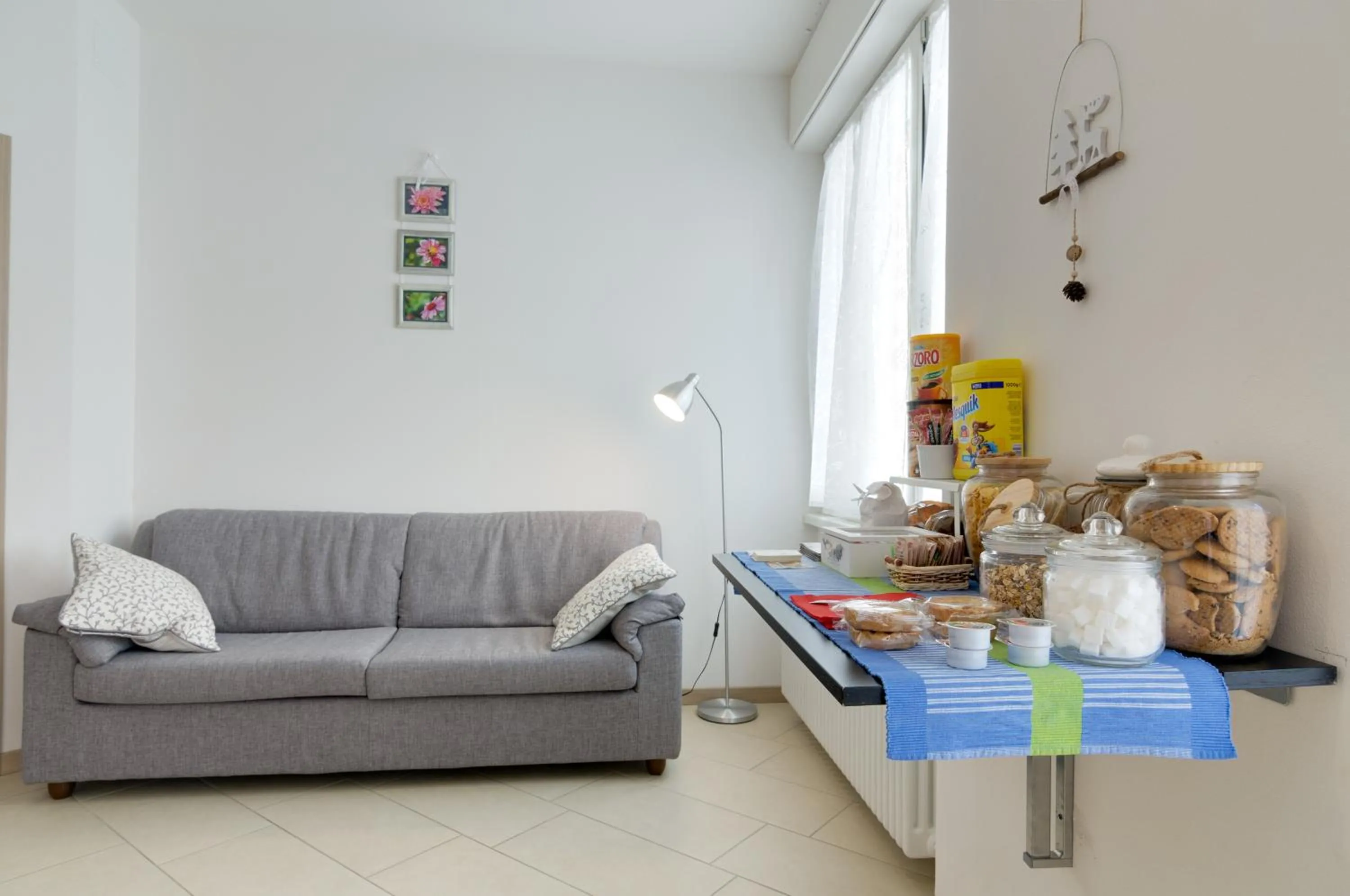 Communal lounge/ TV room in B&B and Apartments Armando Diaz