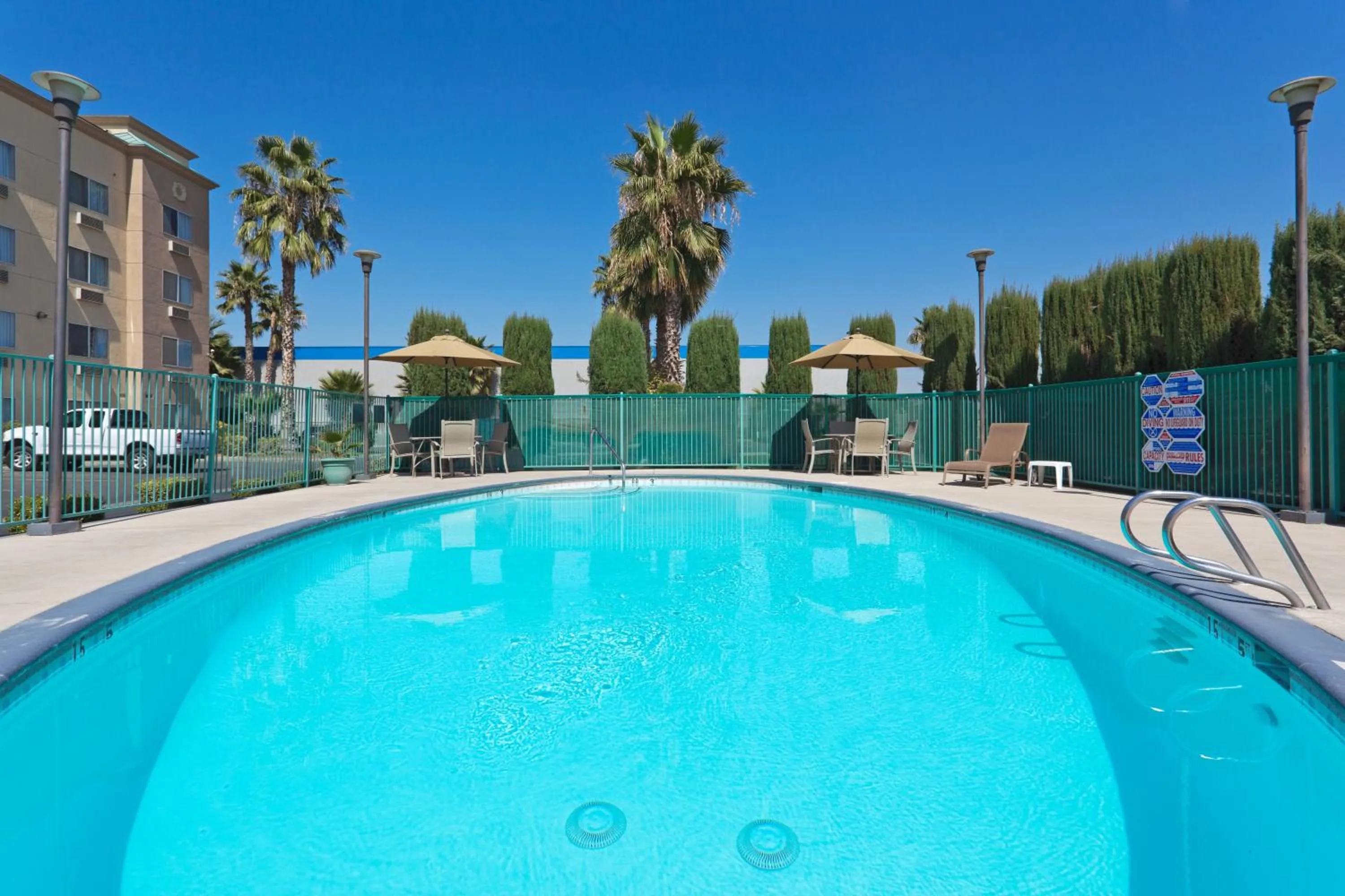 Swimming pool in Holiday Inn Express Bakersfield by IHG