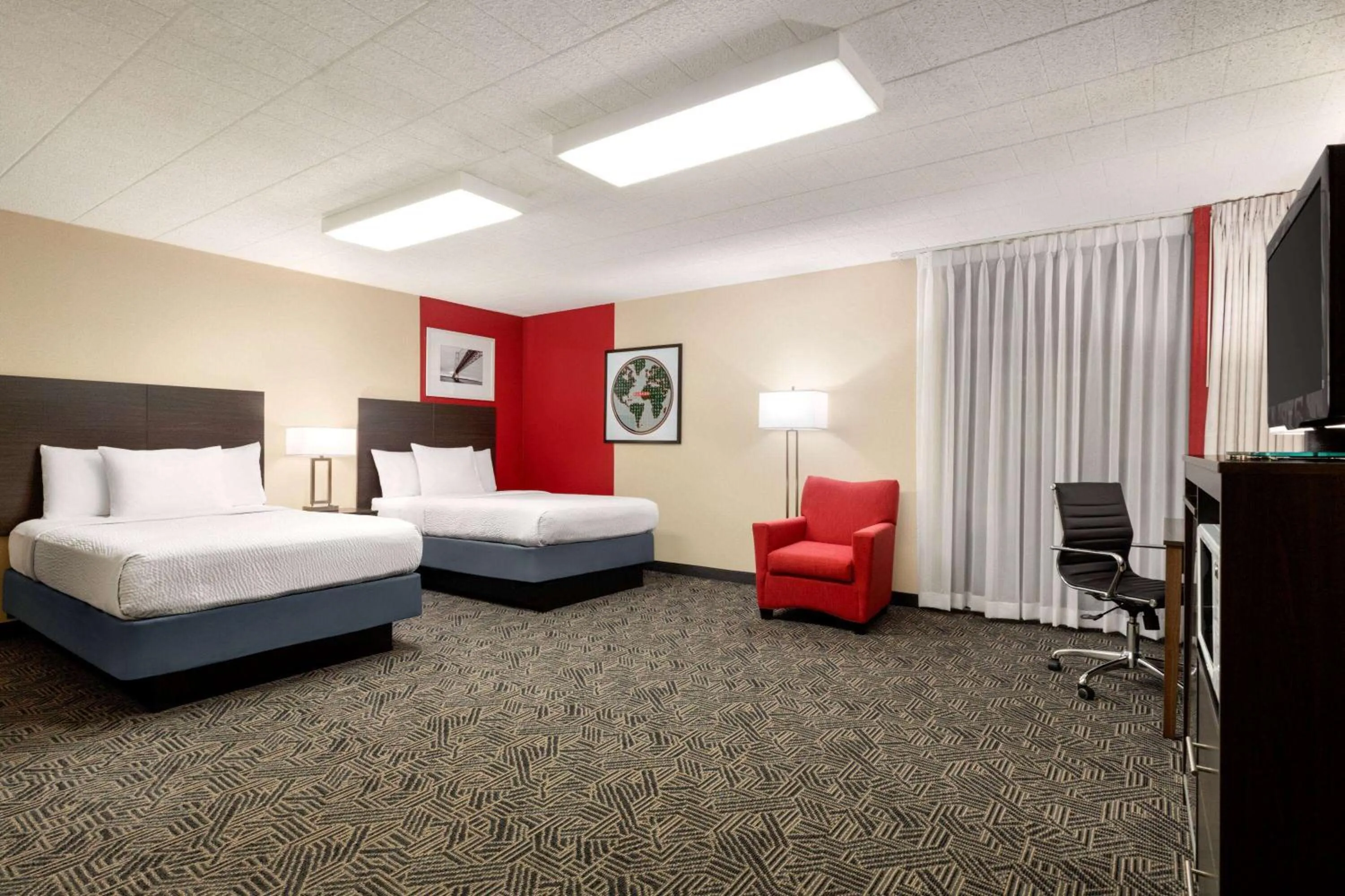 Photo of the whole room, Bed in Ramada by Wyndham Alpena