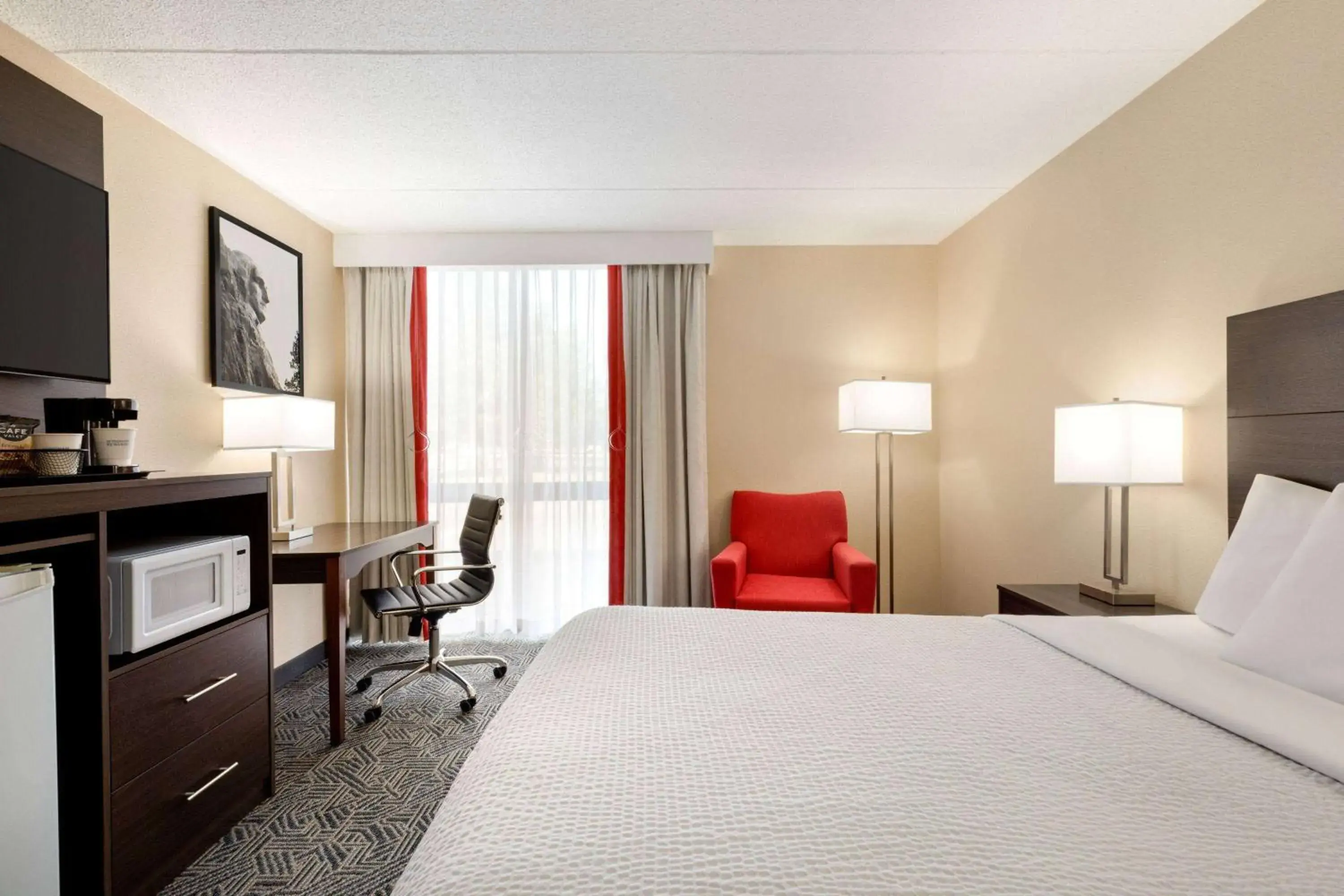 Photo of the whole room, Bed in Ramada by Wyndham Alpena Photo of the whole room, Bed in Ramada by Wyndham Alpena