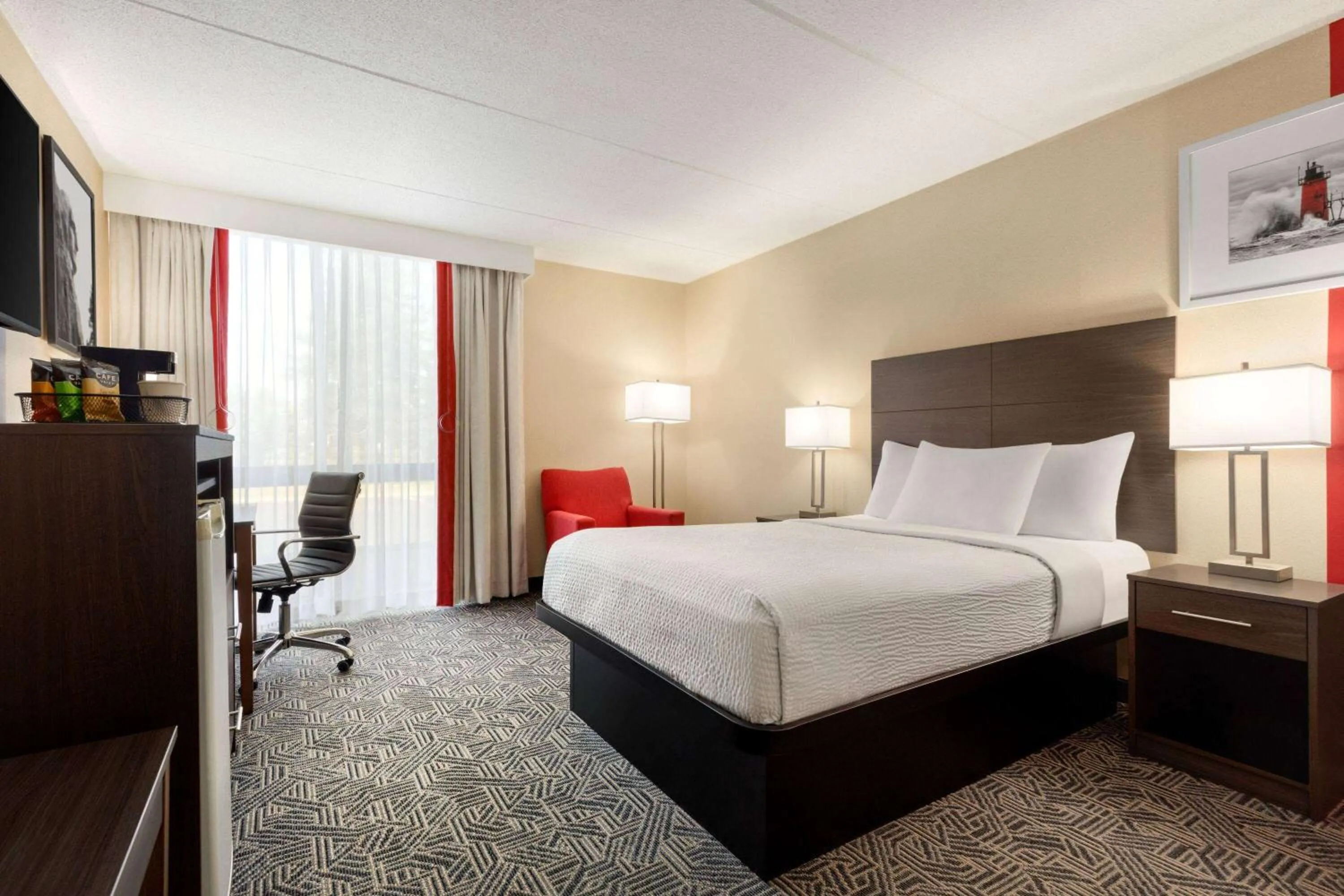 Photo of the whole room, Bed in Ramada by Wyndham Alpena