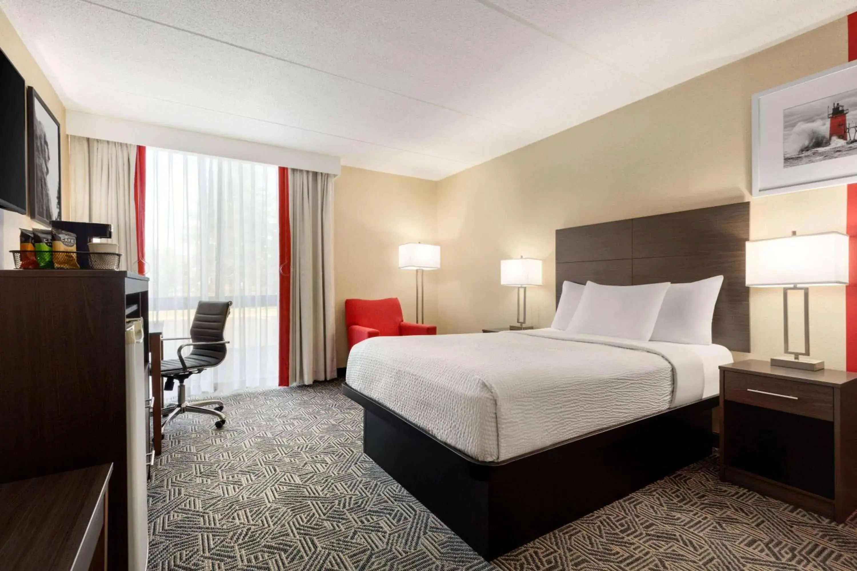 Photo of the whole room, Bed in Ramada by Wyndham Alpena Photo of the whole room, Bed in Ramada by Wyndham Alpena