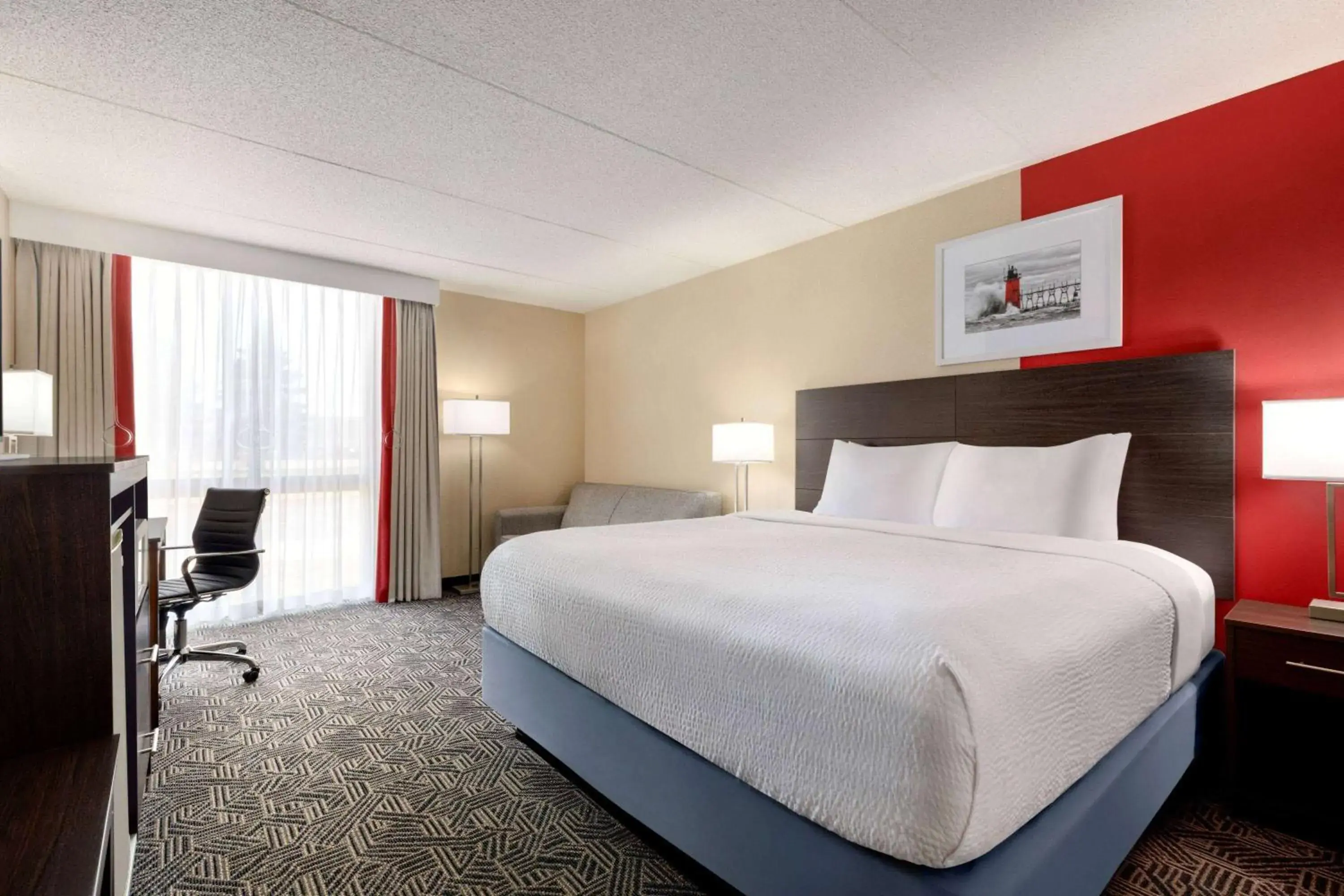 Photo of the whole room, Bed in Ramada by Wyndham Alpena Photo of the whole room, Bed in Ramada by Wyndham Alpena