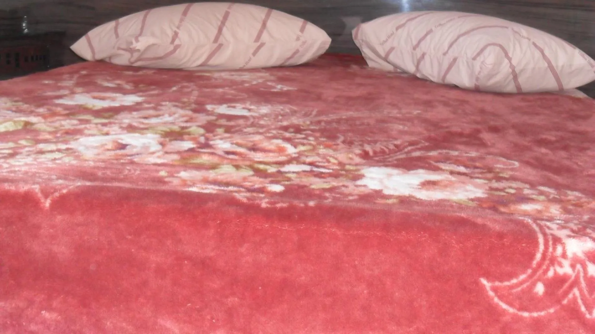 Bed in Trilhos Hotel