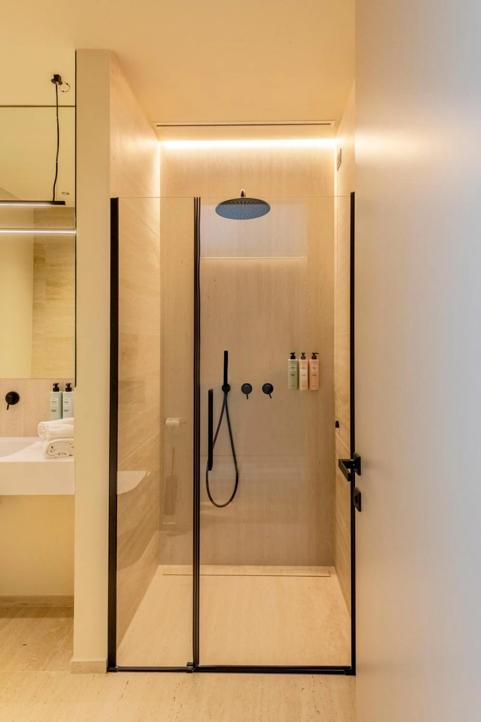 Shower in International Hotel & Suite
