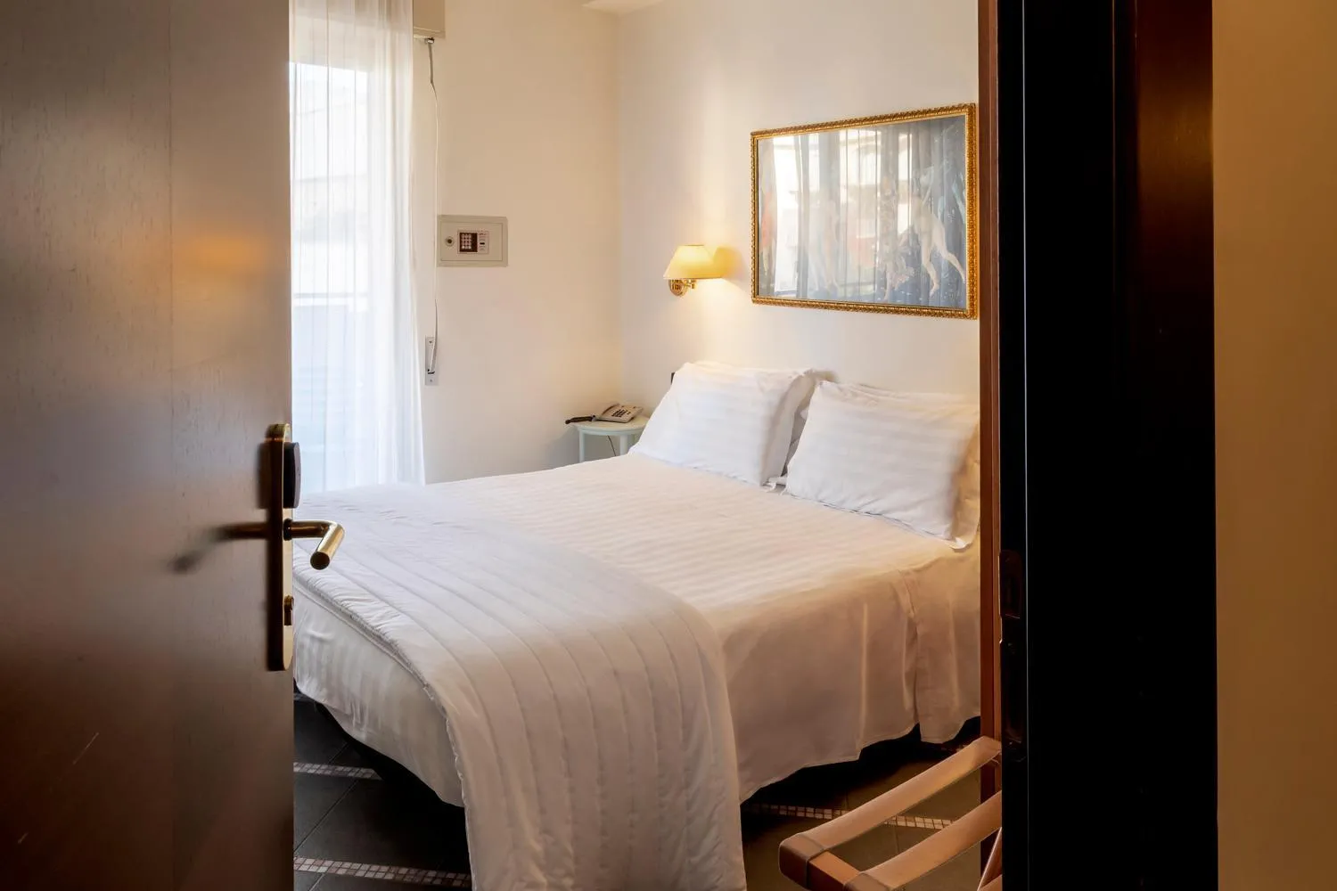 Bed in International Hotel & Suite